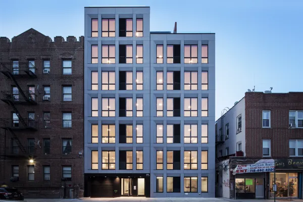 a view of a building and a book shelf