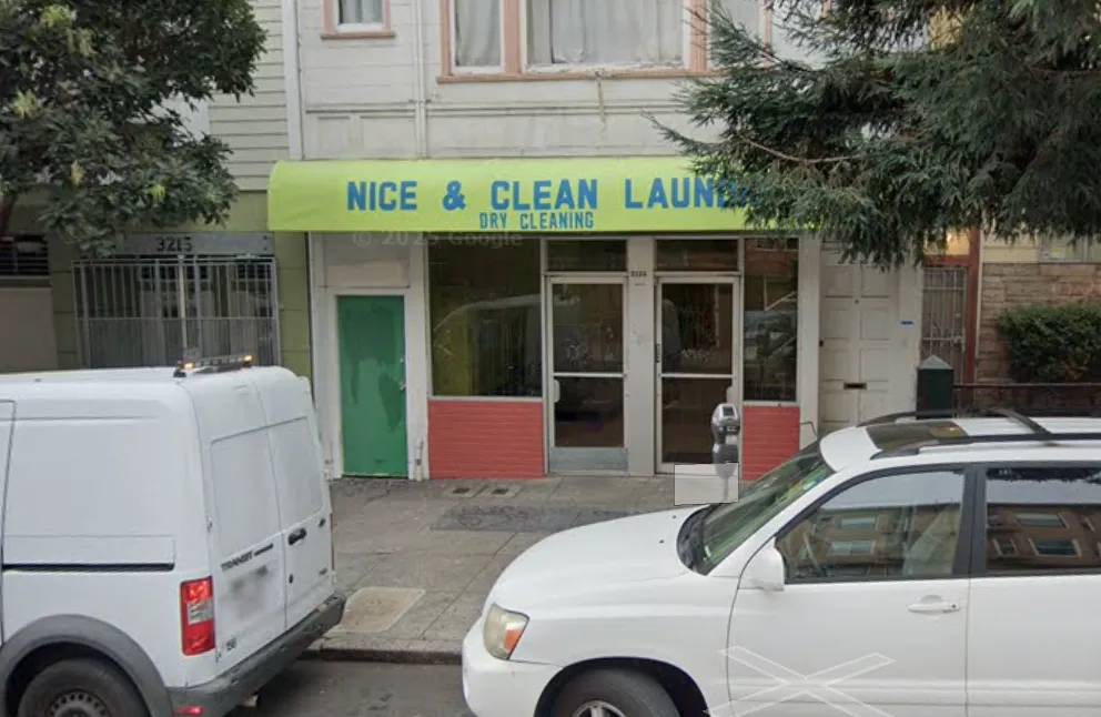 a front view of a house with parking space