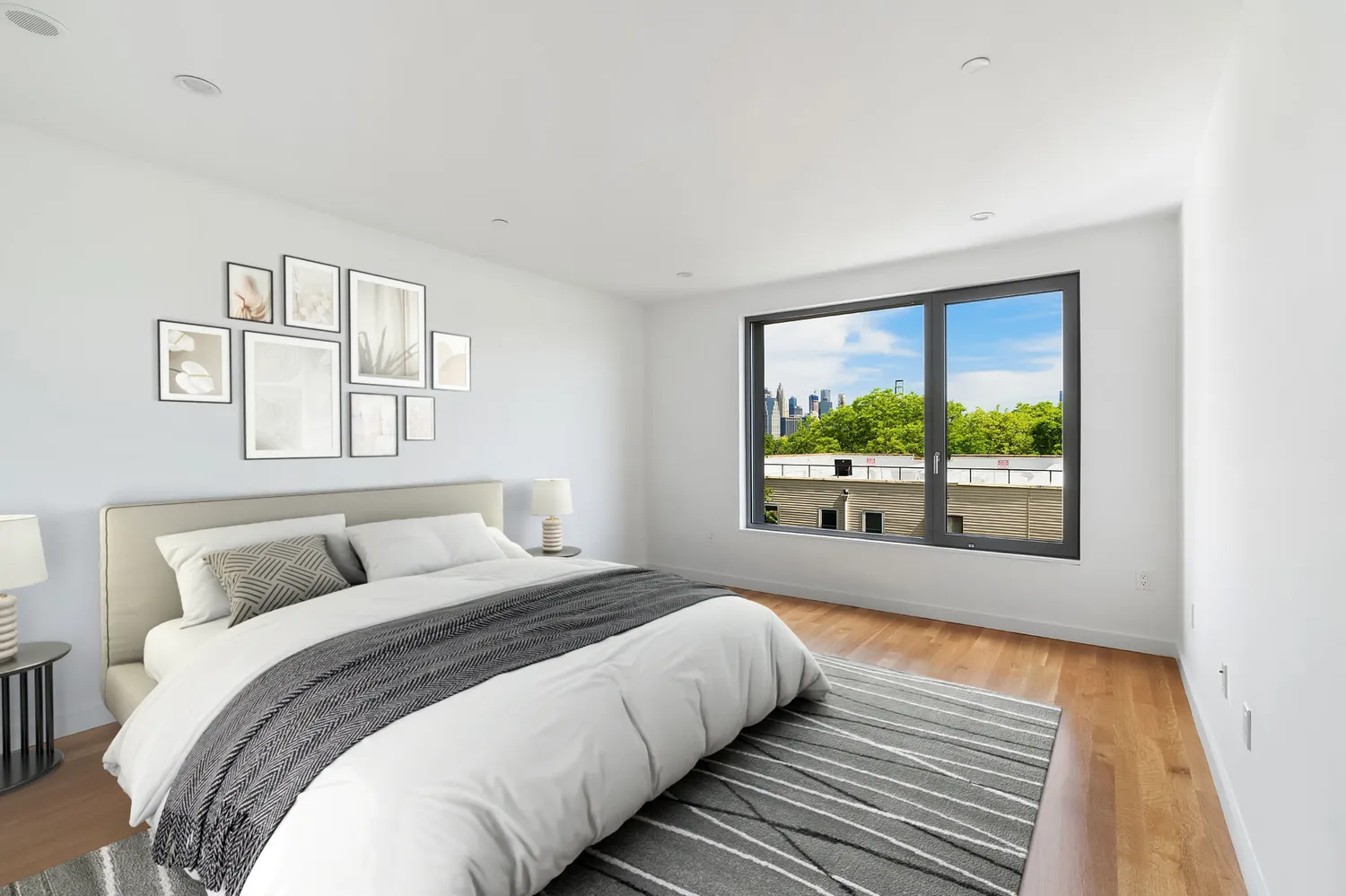 a bedroom with a large bed and a window