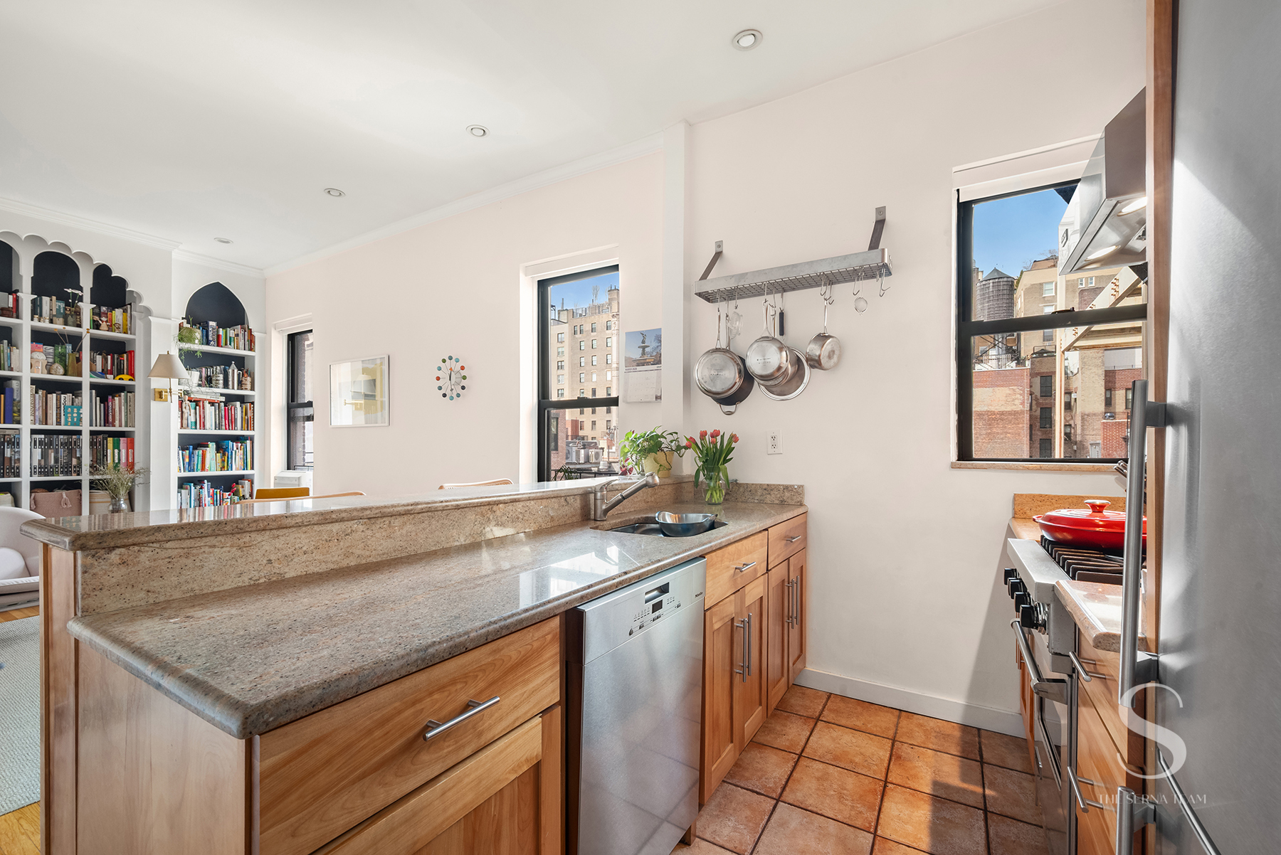 30 East 95th Street, Unit 6F Manhattan, NY 10128 - Photo 3 of 9 a utility room with stainless steel appliances granite countertop a sink and a window