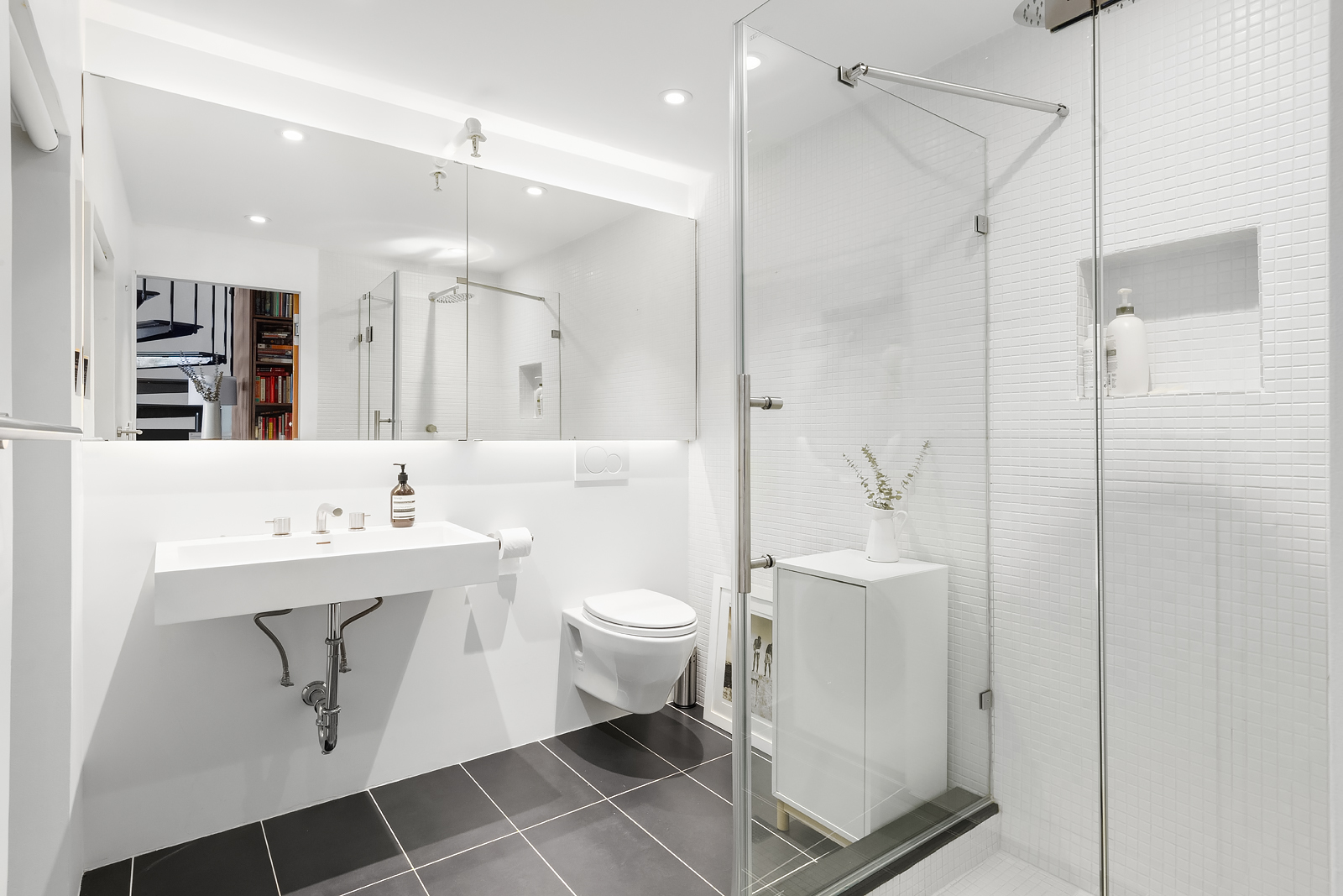 120 Boerum Place, Unit 3E Brooklyn, NY 11201 - Photo 9 of 14 a bathroom with a sink a toilet and shower