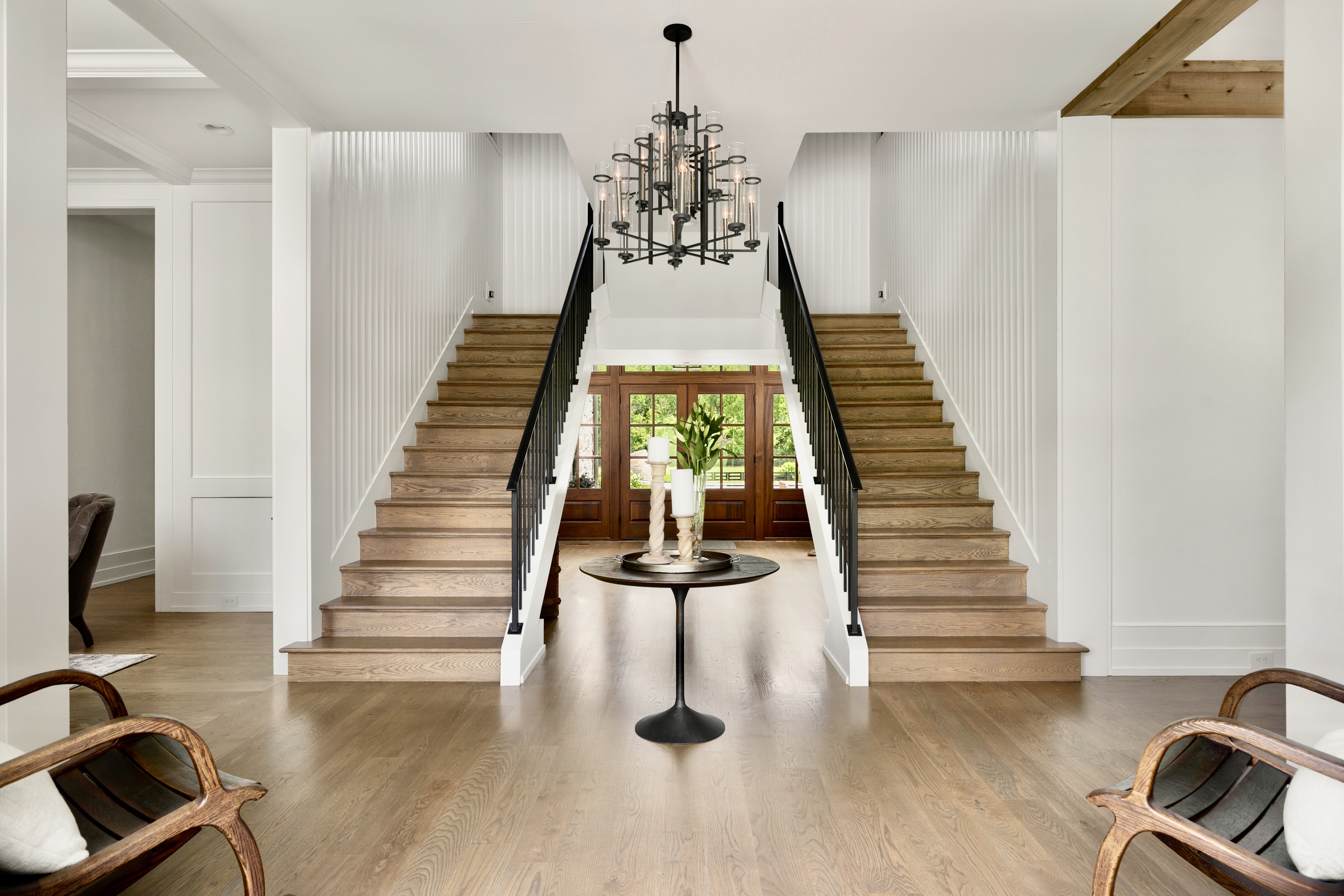 5747 Garrison Road Franklin, TN 37064 - Photo 9 of 47 a view of a hall with stairs and furniture