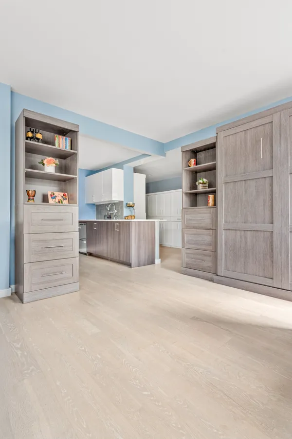 a view of room with cabinet and cabinet