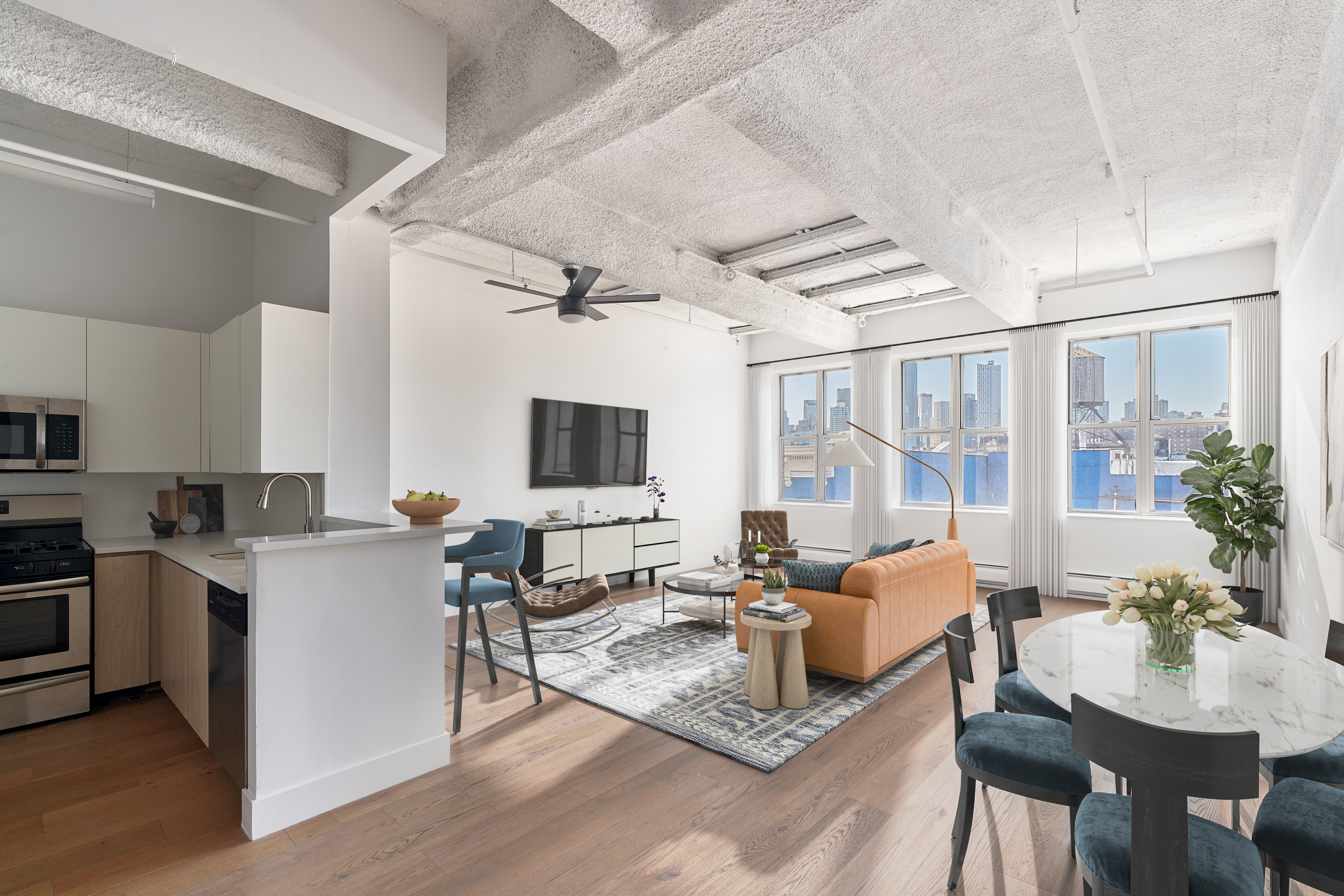 a living room with furniture and a flat screen tv
