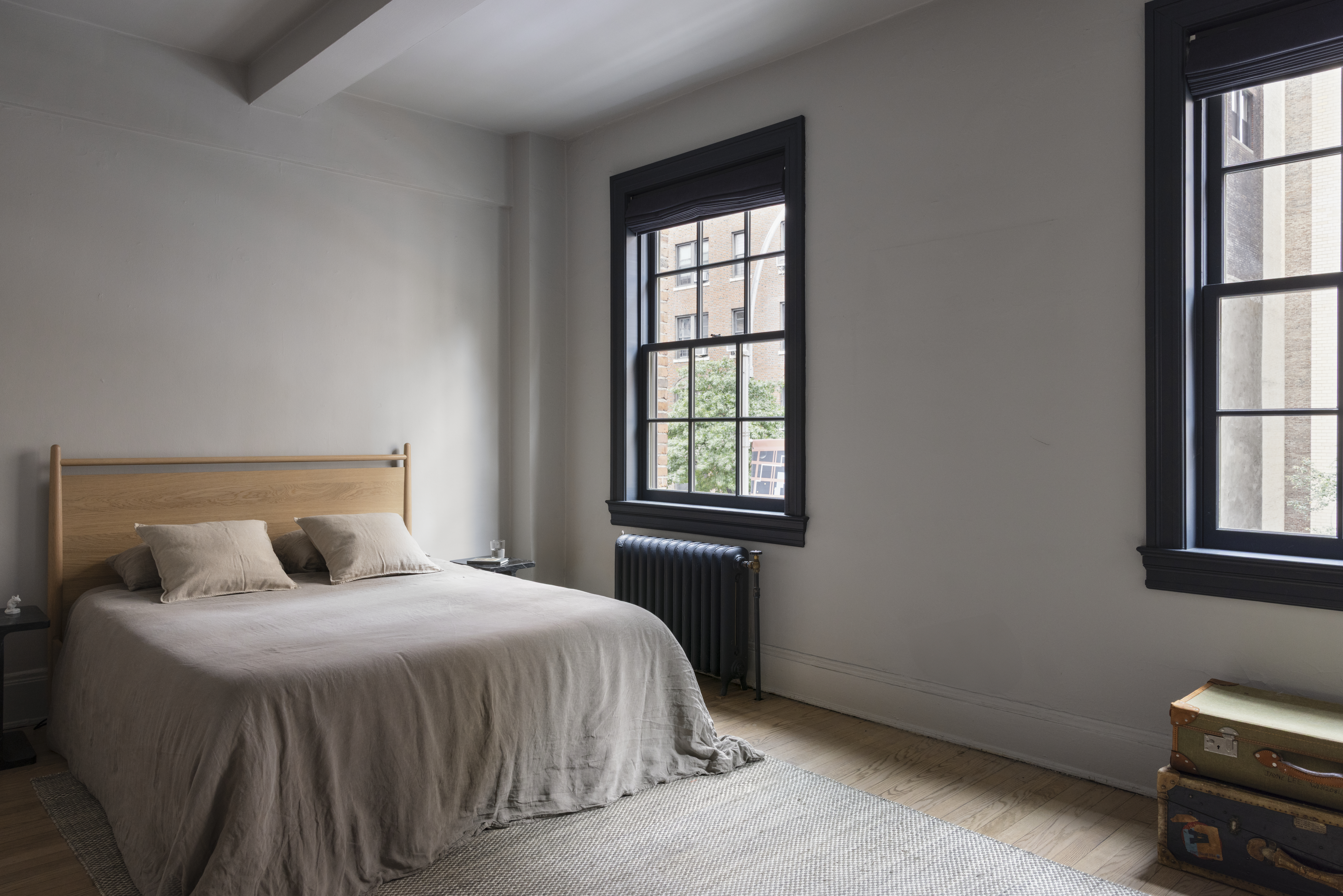 264 Lexington Avenue, Unit 3A Manhattan, NY 10016 - Photo 8 of 12 a bedroom with a bed and window