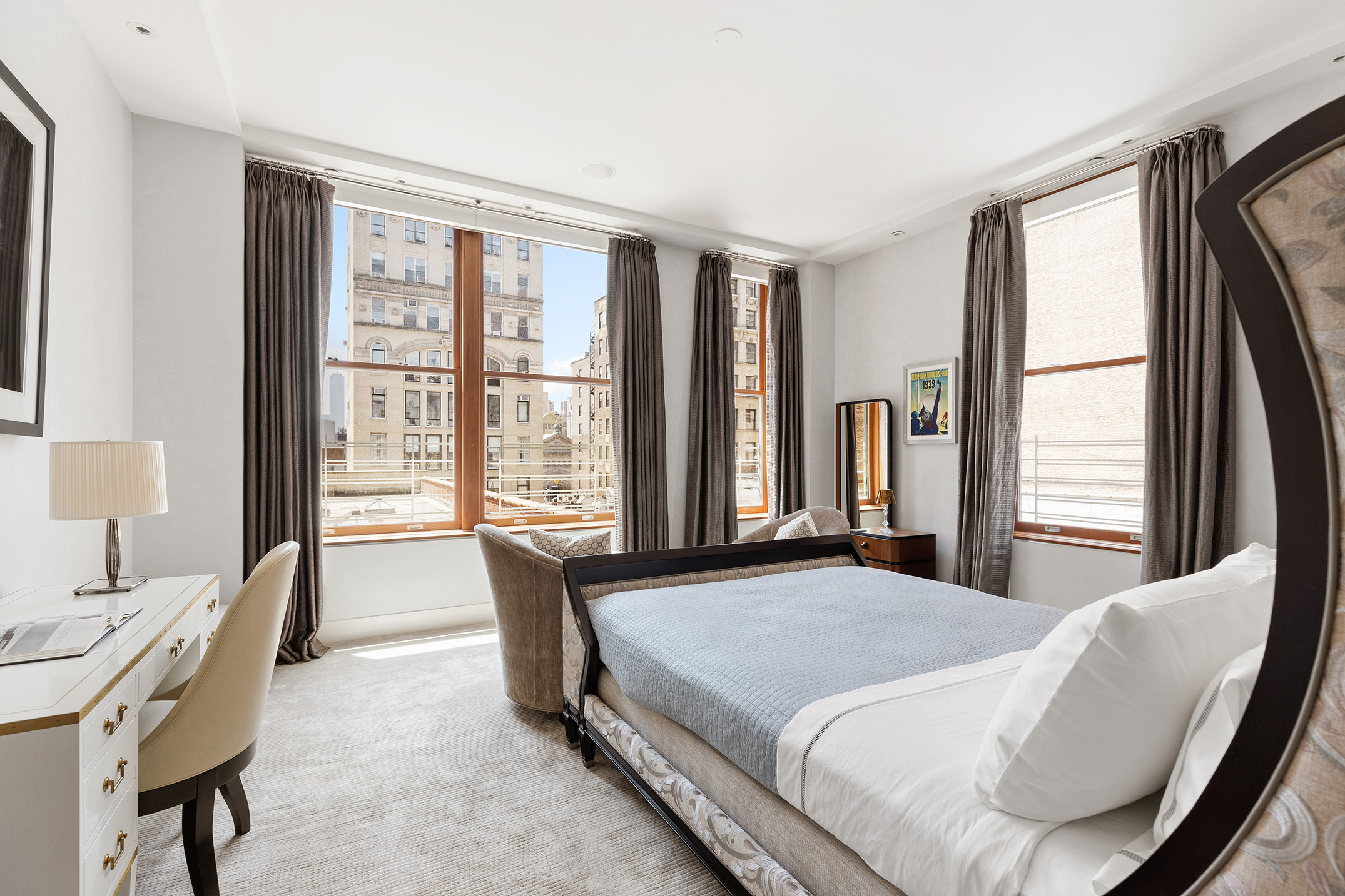 32 West 18th Street, Unit 7B Manhattan, NY 10011 - Photo 10 of 19 a bedroom with a bed and a large window