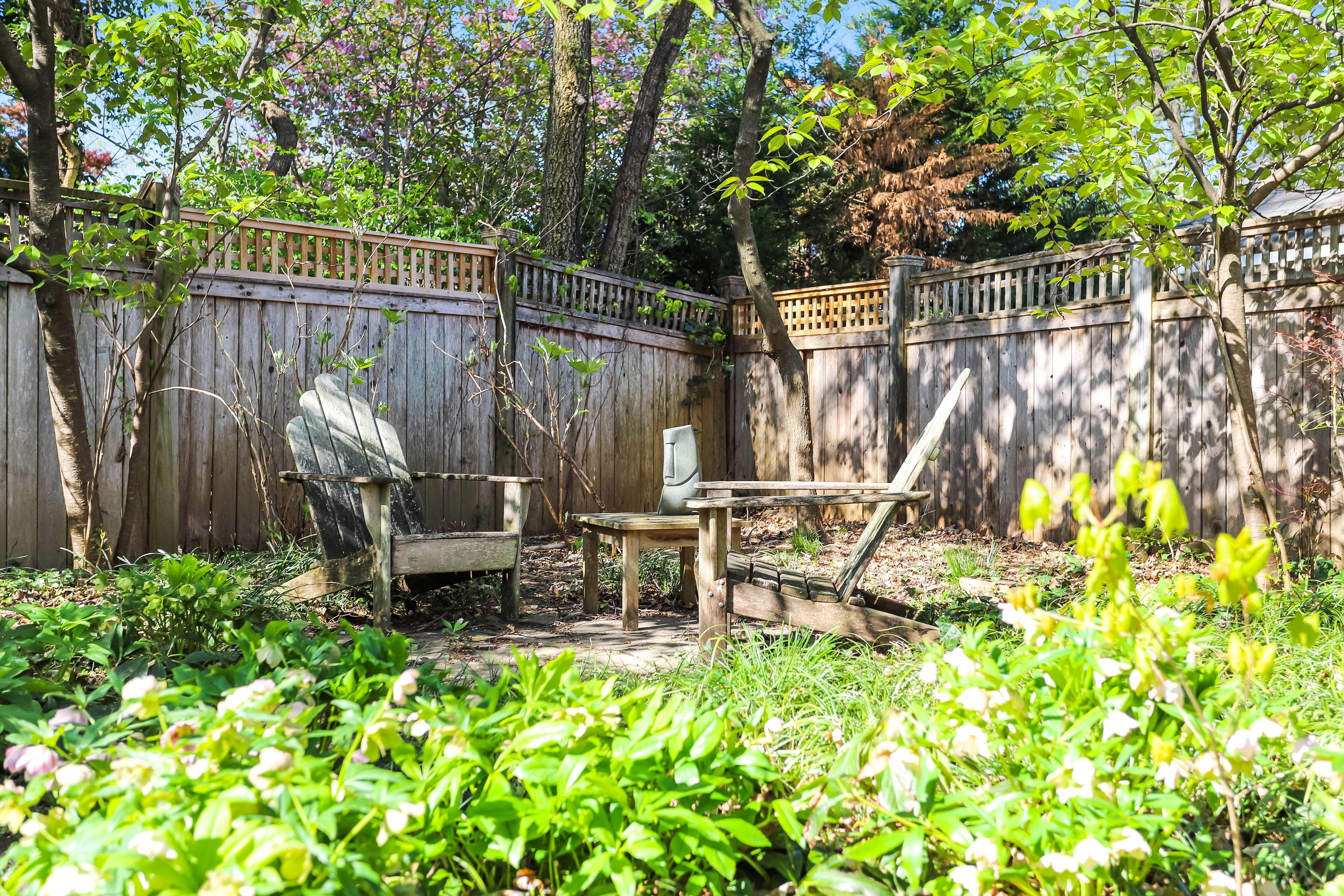 7903 Curtis Street Chevy Chase, MD 20815 - Photo 47 of 49 a view of backyard with a table and chairs