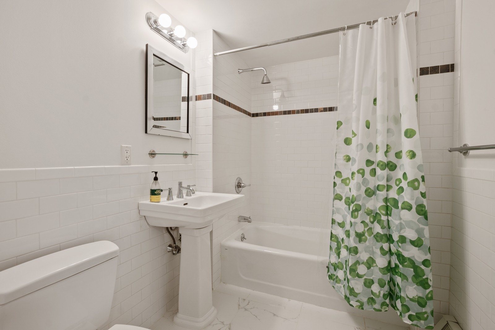 189 Avenue C, Unit 6A Manhattan, NY 10009 - Photo 5 of 10 a bathroom with a sink toilet and shower