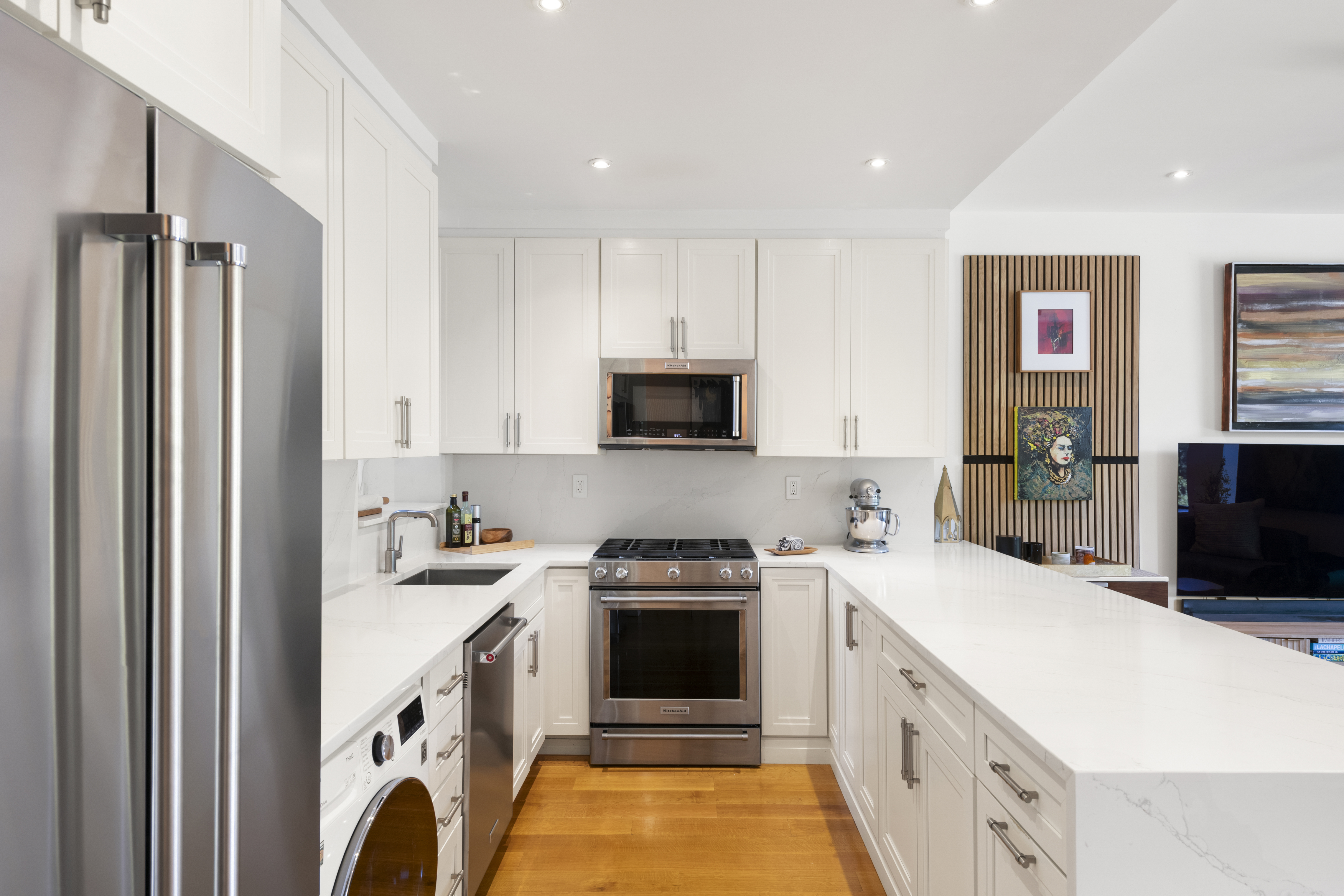 364 West 121st Street, Unit 2A Manhattan, NY 10027 - Photo 4 of 13 a kitchen with a sink stove and refrigerator