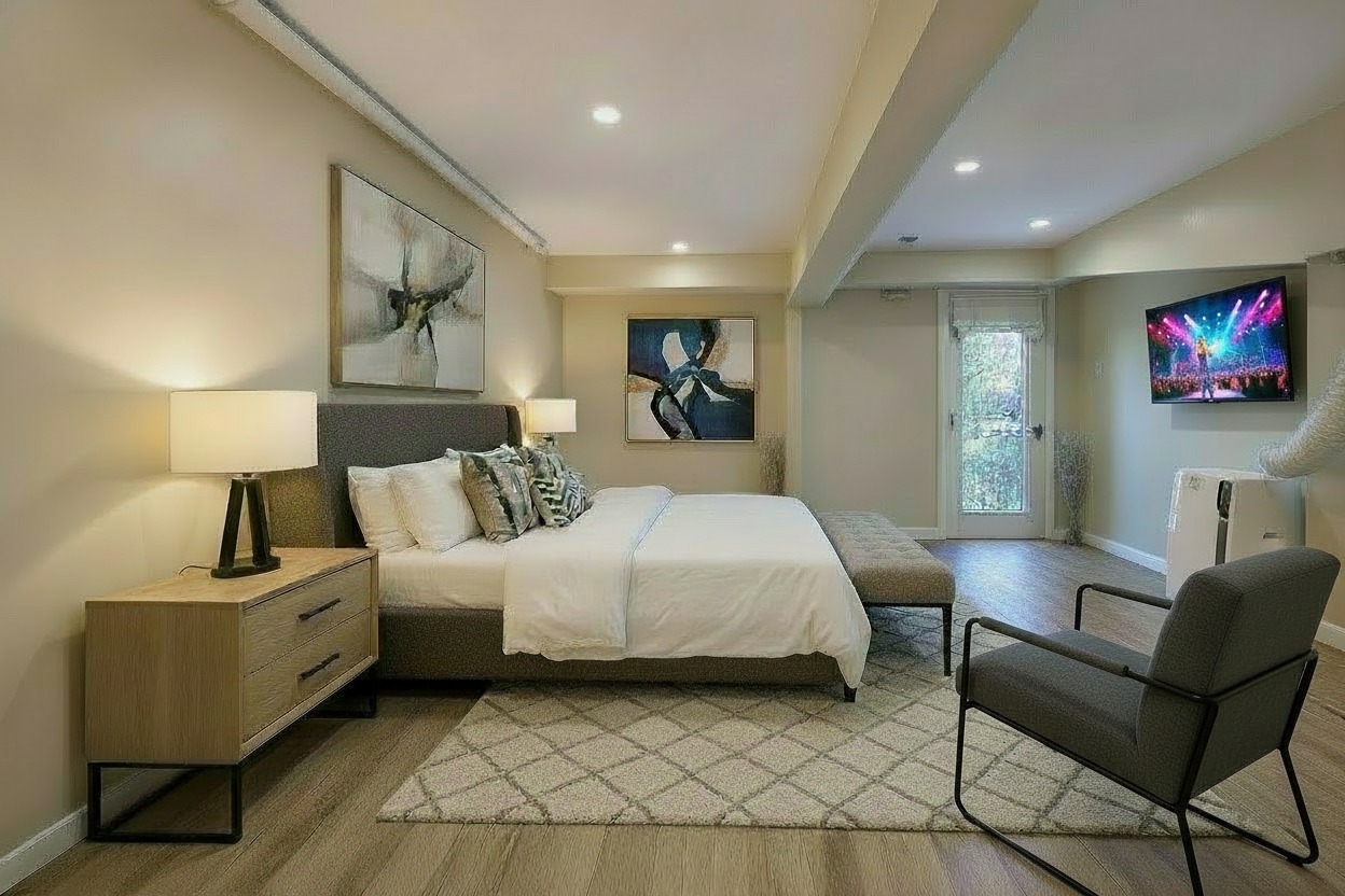 288 St James Place, Unit TRIPLEX Brooklyn, NY 11238 - Photo 22 of 25 a bed room with a bed and a chair