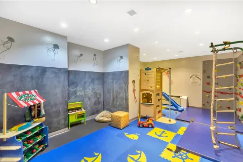 a living room with dining room and a table