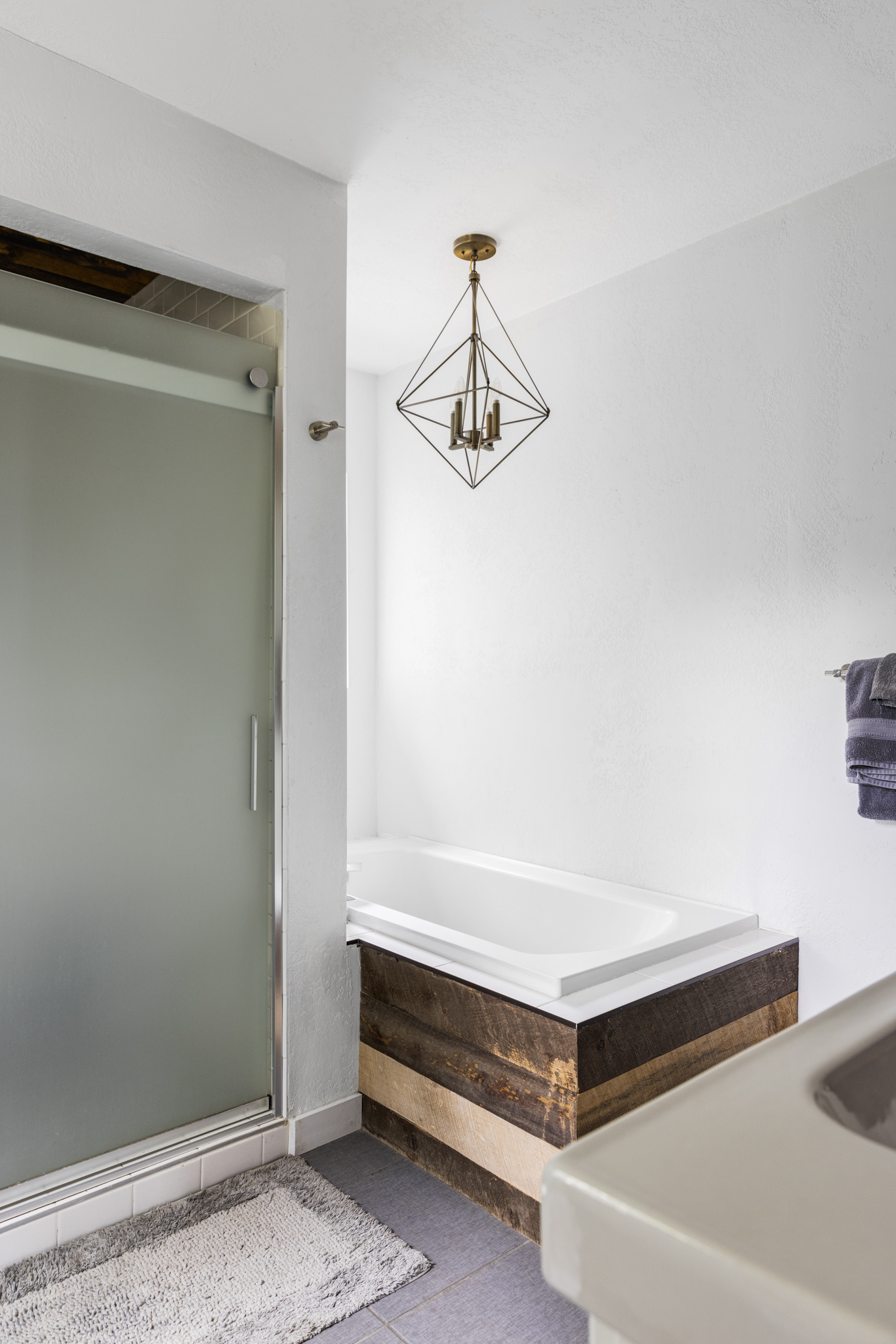 133 Gold Run Road Alma, CO 80420 - Photo 27 of 46 a bathroom with a bathtub and a shower