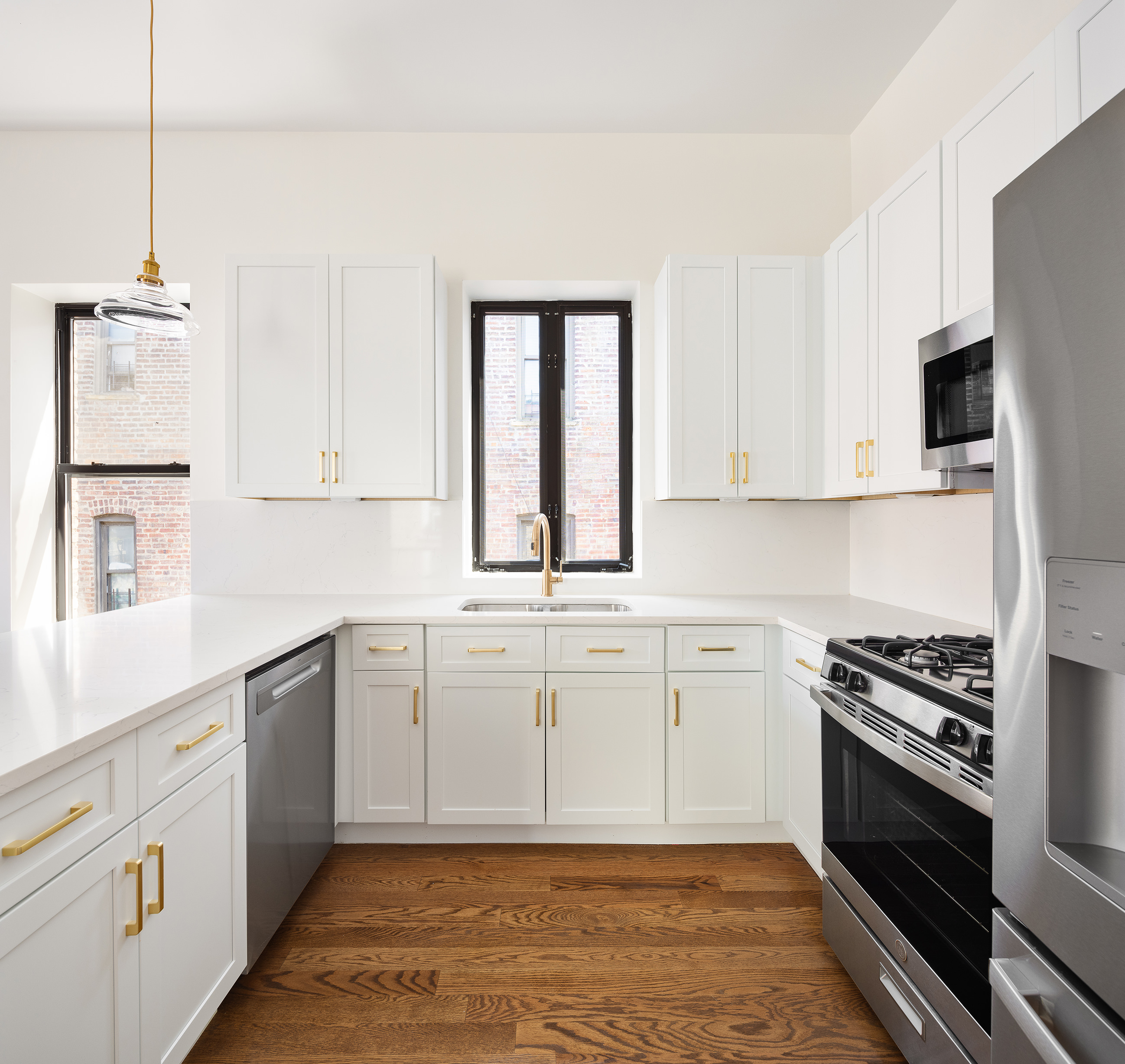 282 Buffalo Avenue, Unit 1 Brooklyn, NY 11213 - Photo 3 of 9 a kitchen with stainless steel appliances a stove sink and cabinets