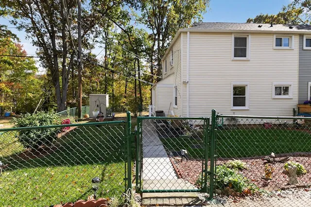a view of a back yard of the house and car parked