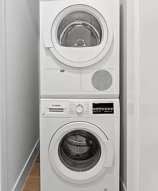 168 Sumpter Street, Unit 2 Brooklyn, NY 11233 - Photo 9 of 10 a utility room with dryer and washer