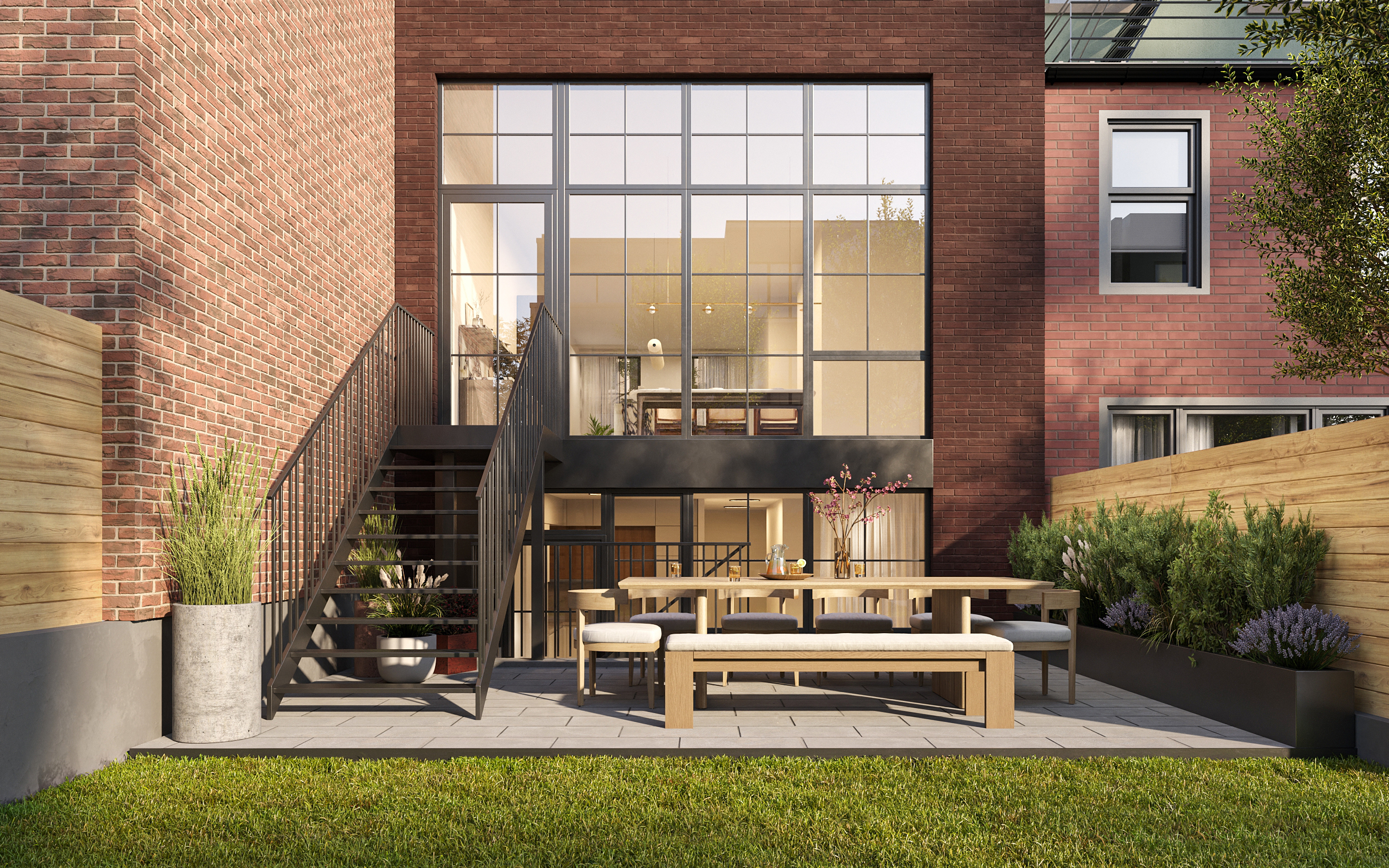 a view of a patio with couches table and chairs and potted plants