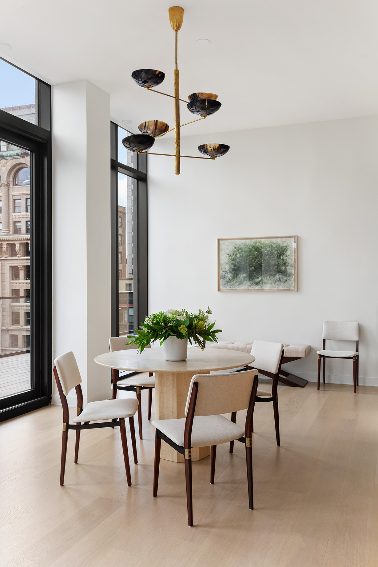 33 Park Row, Unit 17B Manhattan, NY 10038 - Photo 6 of 22 a view of a dining room with furniture