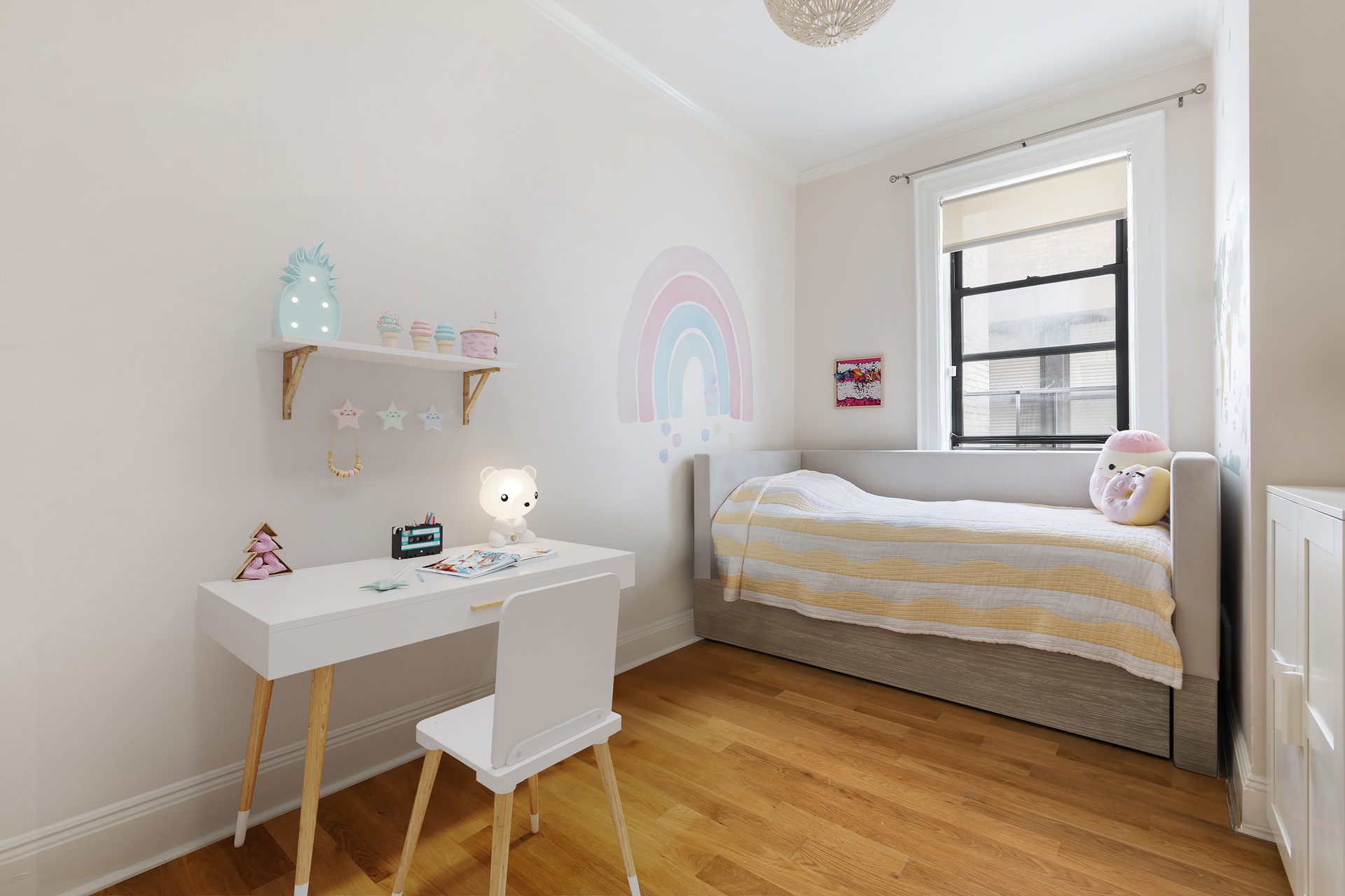 229 West 97th Street, Unit 5M New York, NY 10025 - Photo 9 of 11 a bedroom with a bed and a table in it