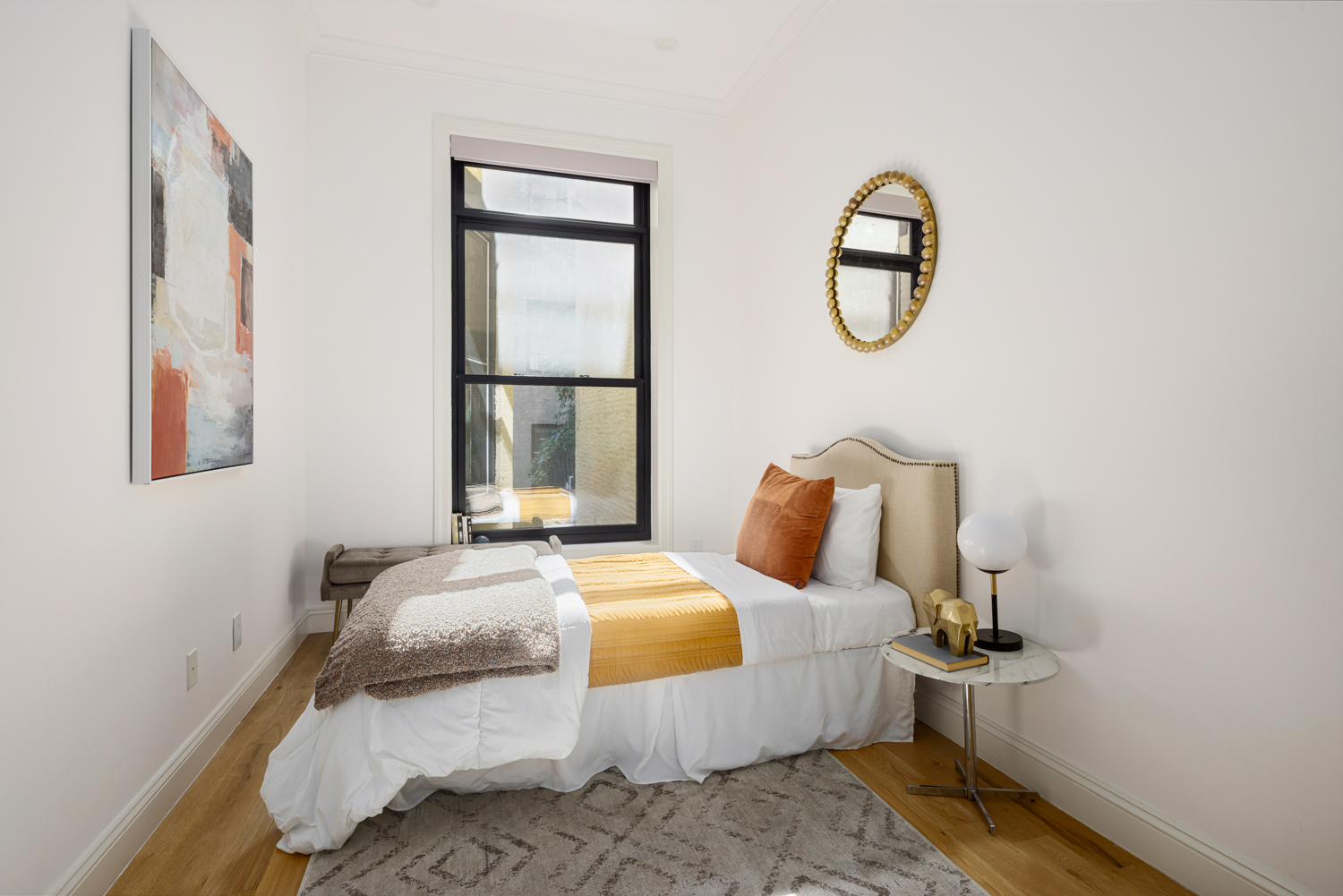 75 8th Avenue, Unit PARLOR Brooklyn, NY 11215 - Photo 12 of 15 a bedroom with a bed and a window