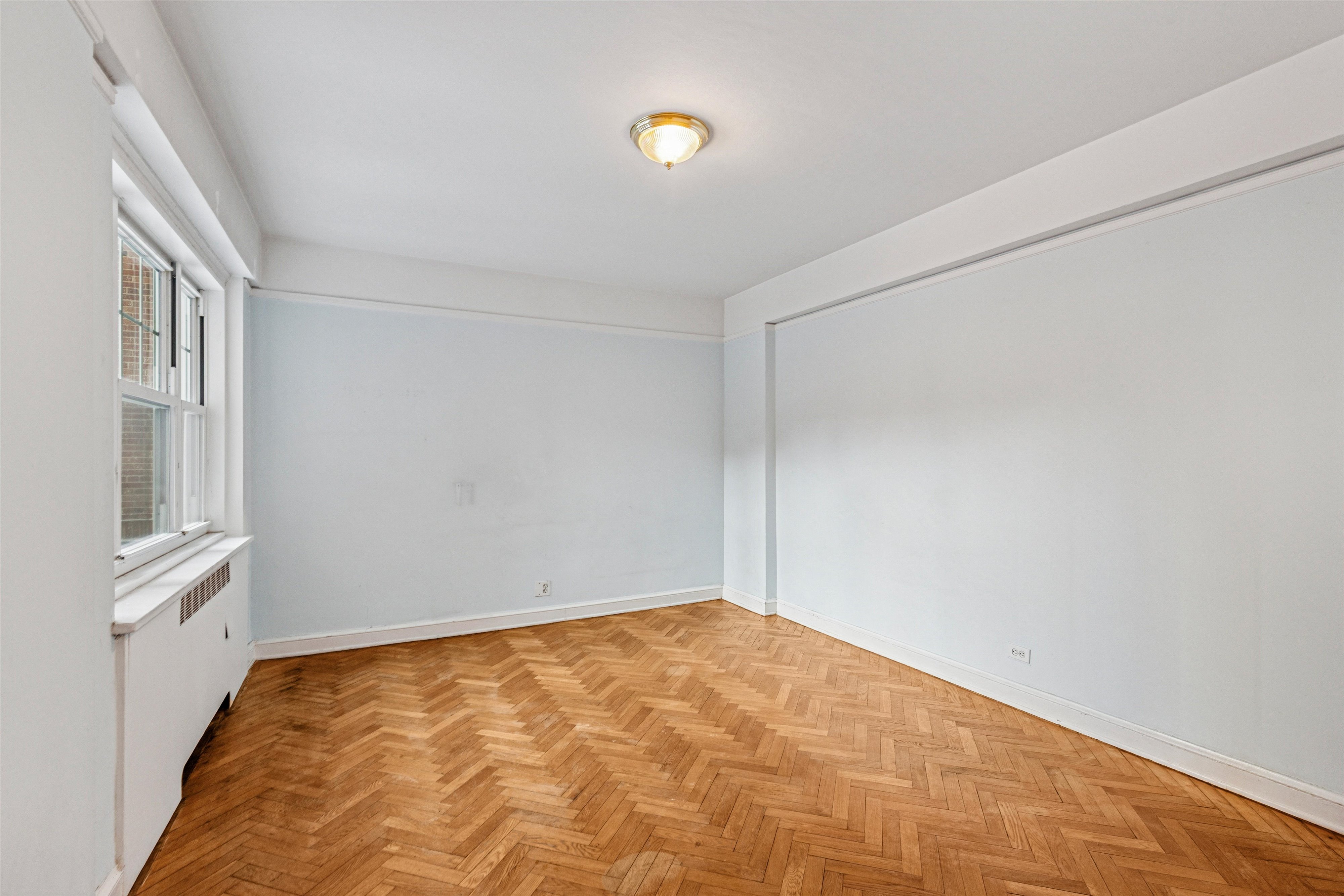 200 Cabrini Boulevard, Unit 10 Manhattan, NY 10033 - Photo 12 of 35 a view of an empty room