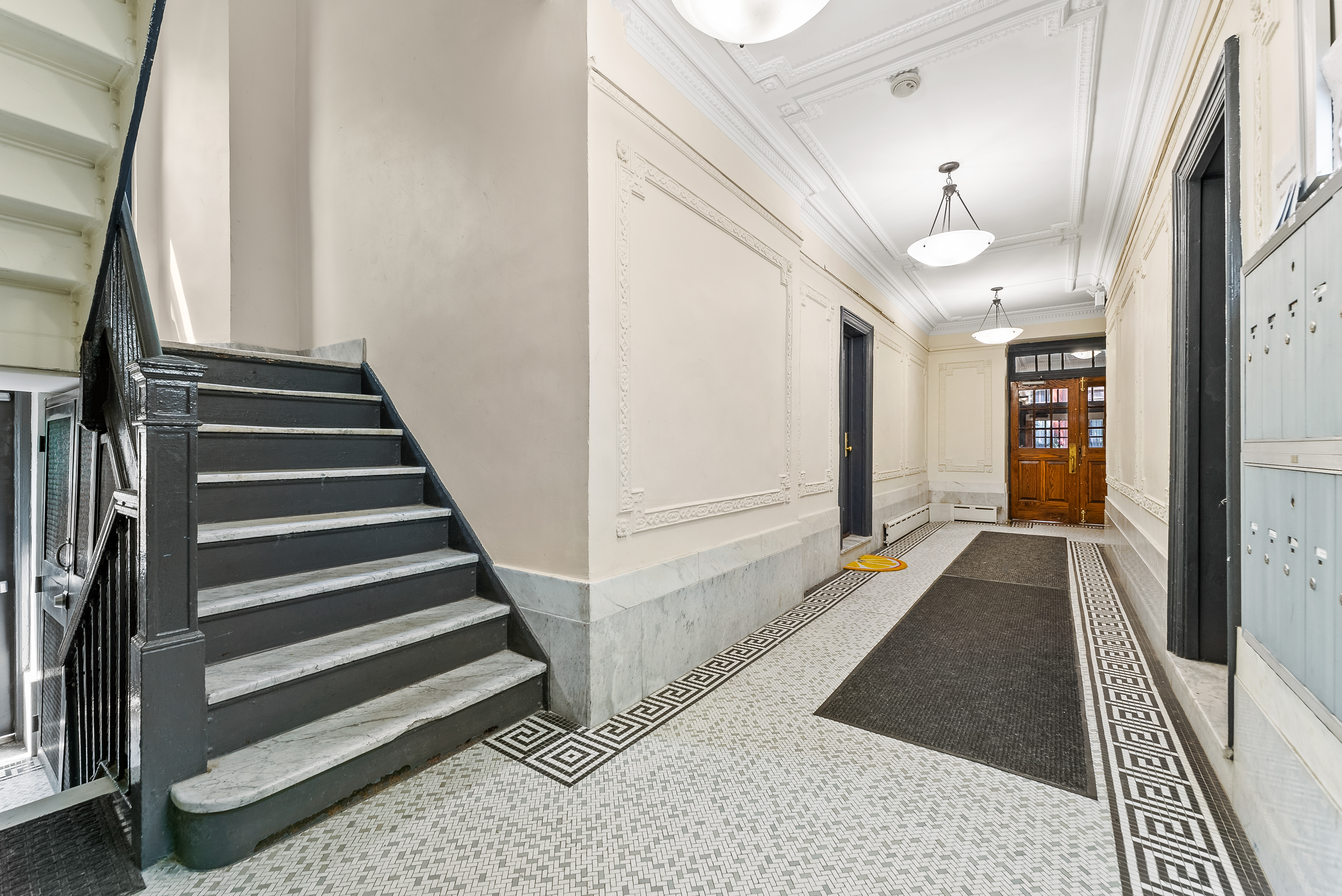 342 West 21st Street, Unit 3E Manhattan, NY 10011 - Photo 9 of 10 a view of a hallway with a white walls