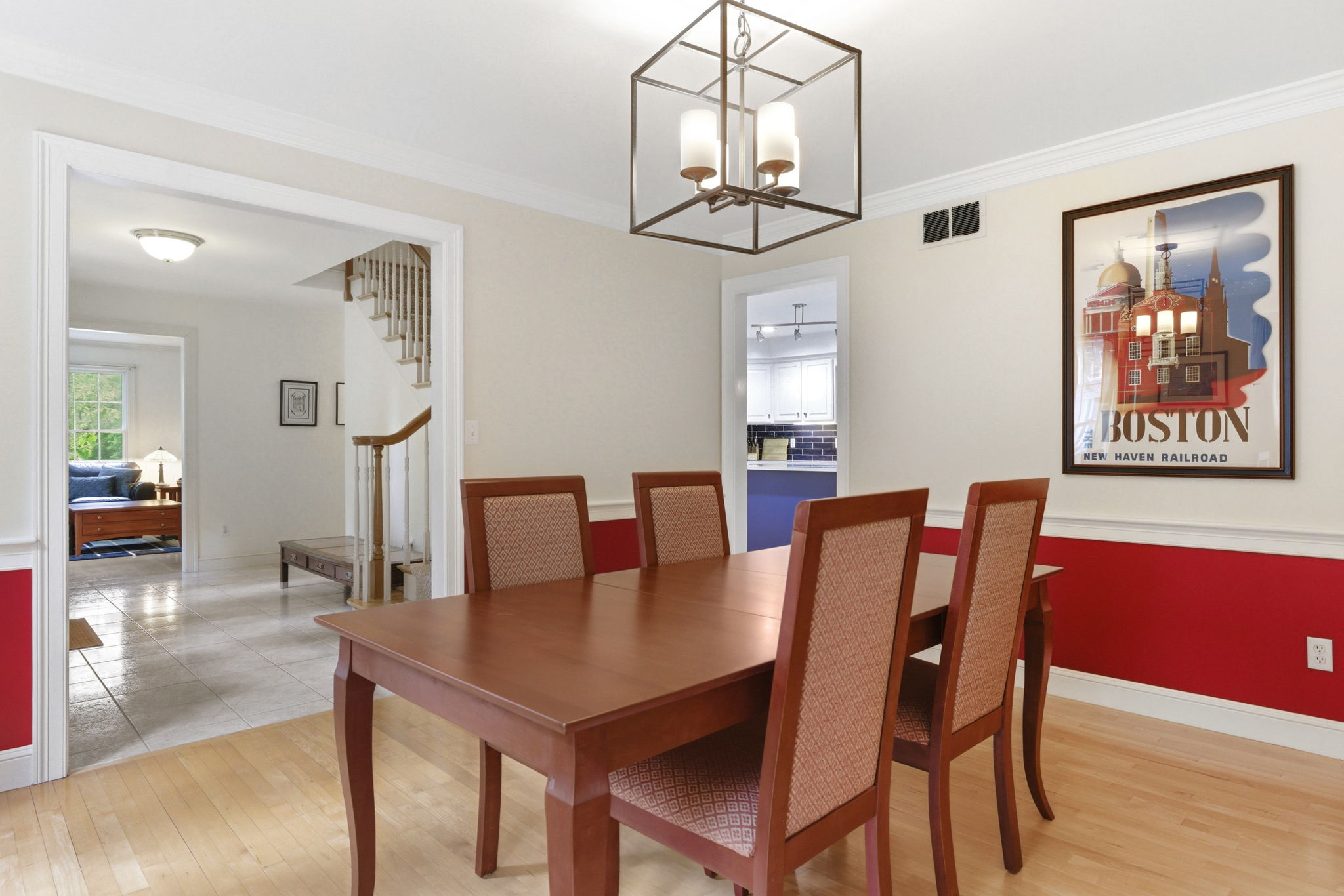 2 Laurel Street Lexington, MA 02421 - Photo 16 of 46 a view of a dining room with furniture a chandelier and wooden floor
