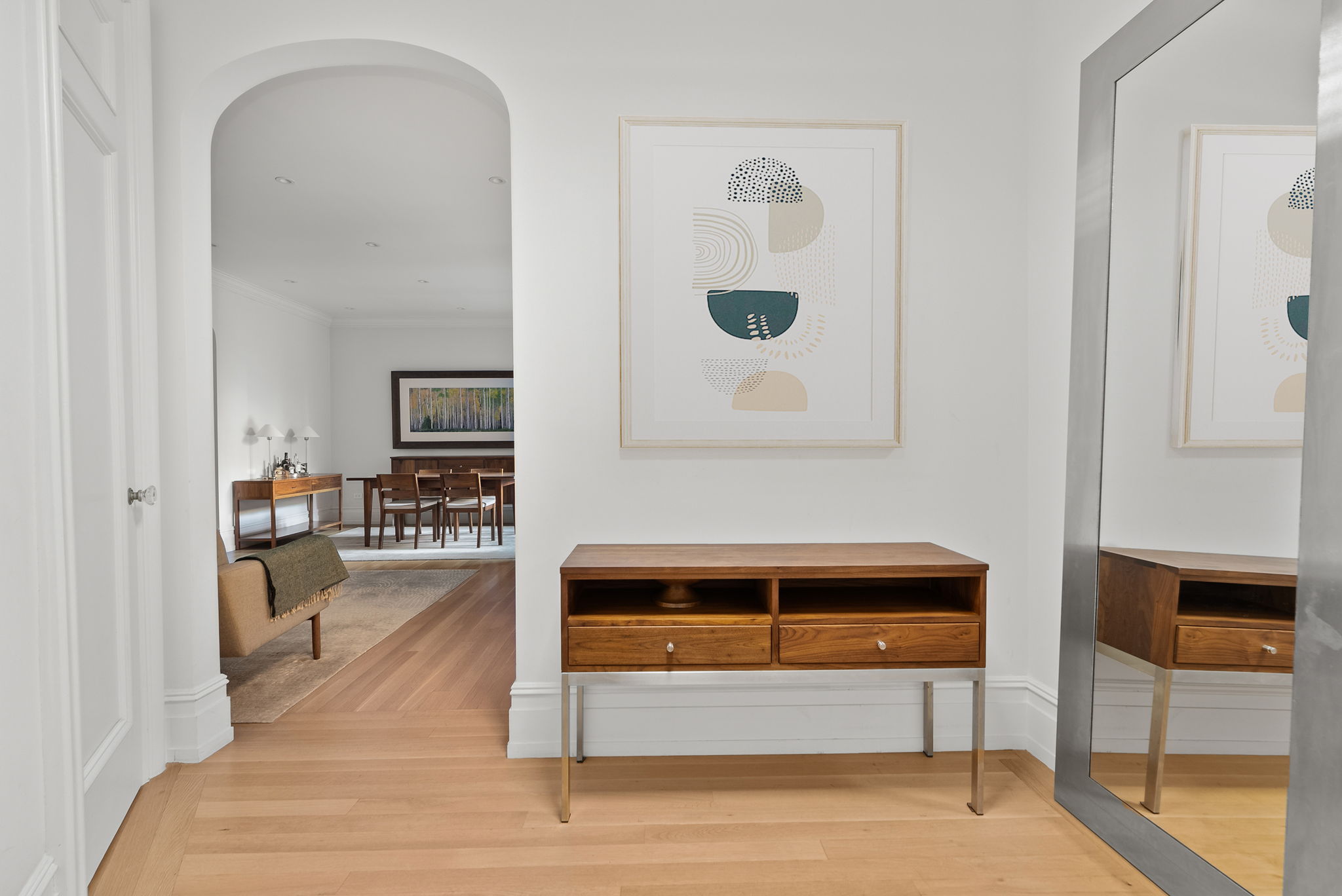 210 Riverside Drive, Unit 2E Manhattan, NY 10025 - Photo 5 of 15 a living room with furniture and a wooden floor