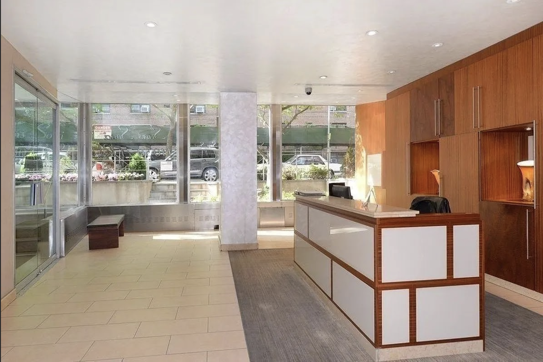 110-50 71st Road, Unit 5N Queens, NY 11375 - Photo 6 of 8 a kitchen with stainless steel appliances granite countertop a refrigerator a sink and a stove