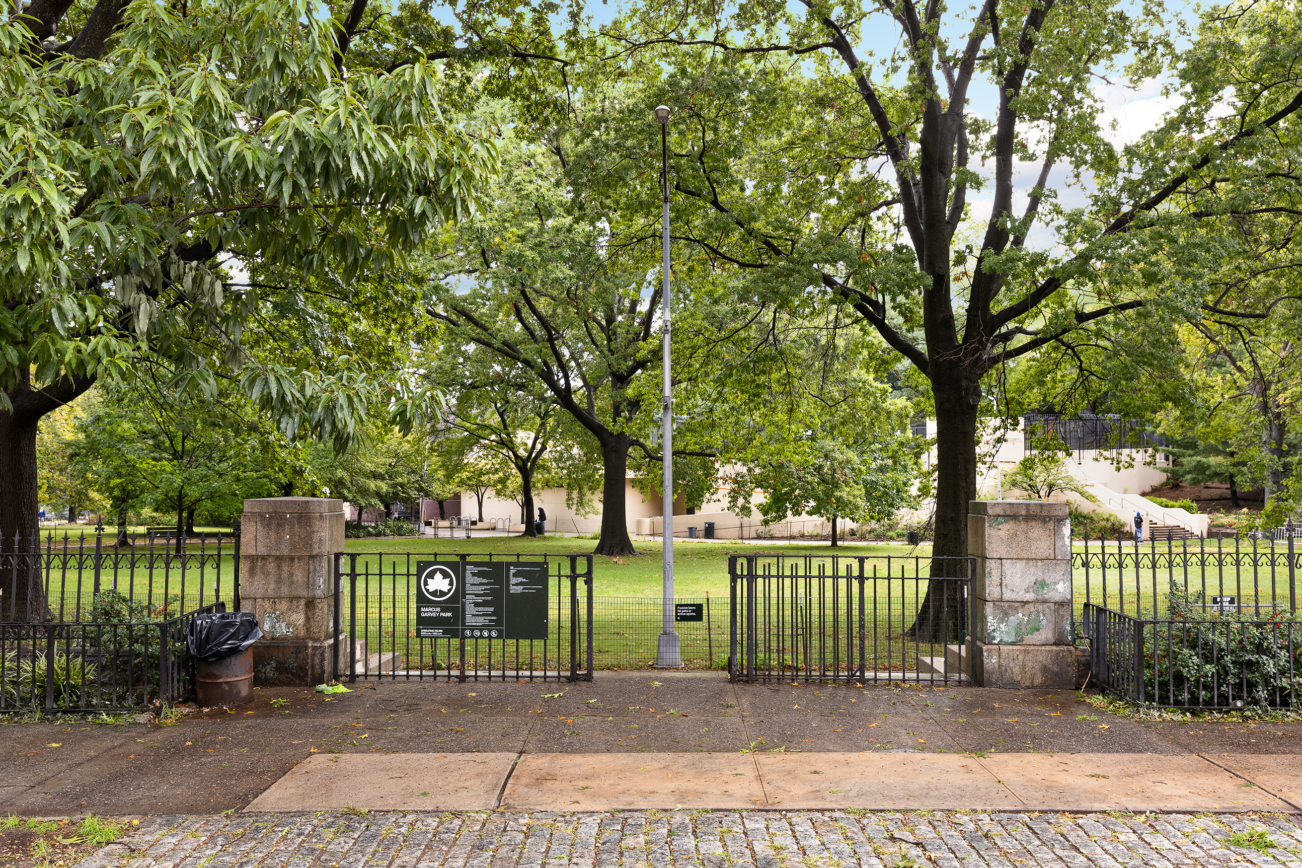 7 Mt Morris Park West, Unit D Manhattan, NY 10027 - Photo 15 of 16 a front view of a house with a garden