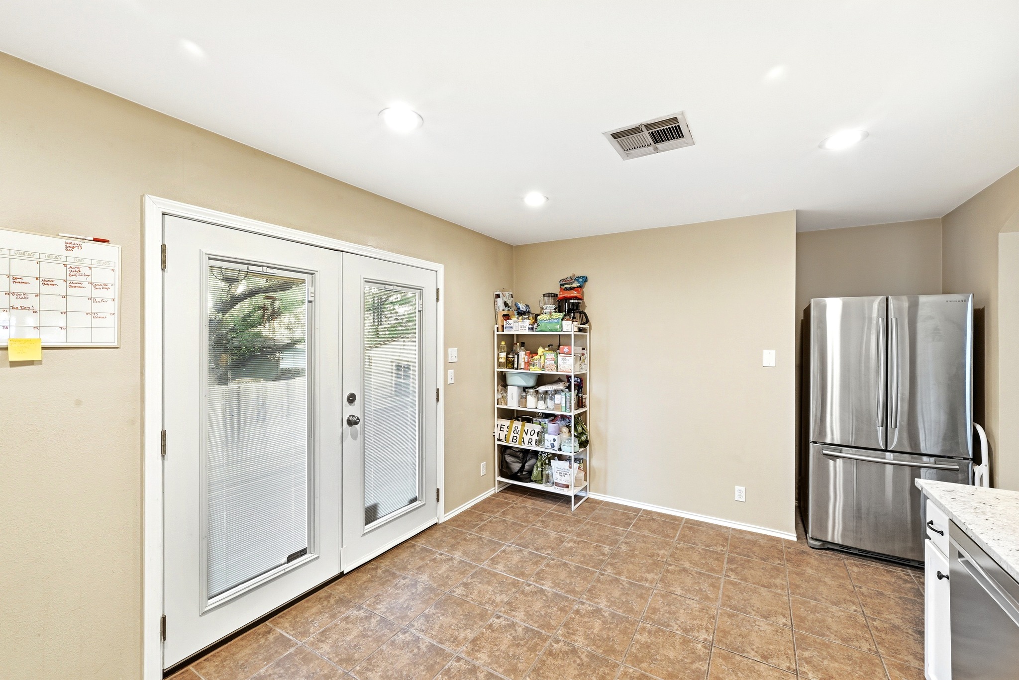 8901 Frock Court Austin, TX 78748 - Photo 17 of 28 a view of an empty room with a cabinet