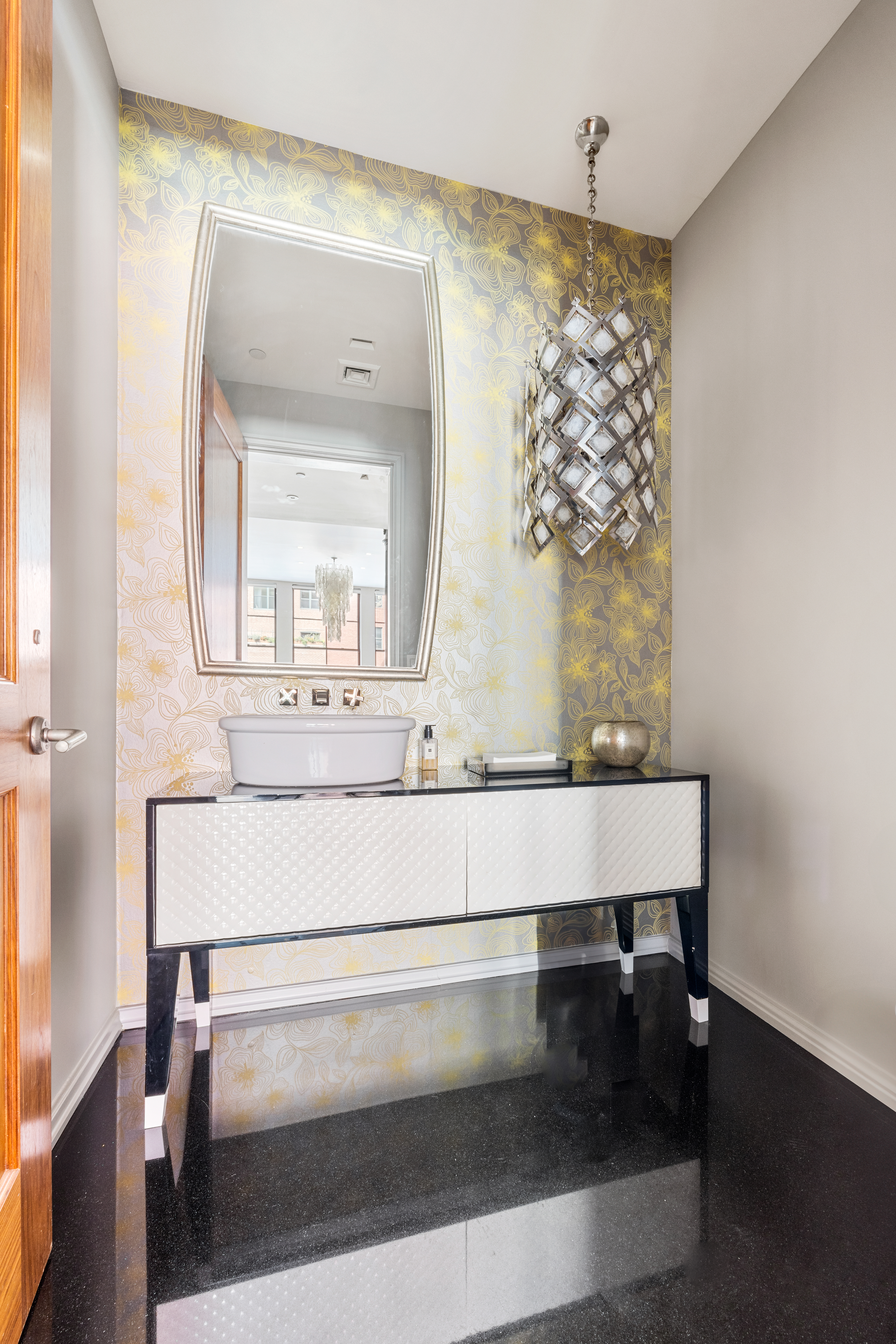 140 Franklin Street, Unit 2B Manhattan, NY 10013 - Photo 12 of 14 a view of bathroom with a sink and a mirror