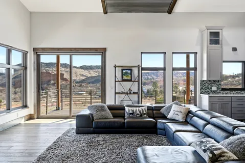 a kitchen with a stove a refrigerator and a sink