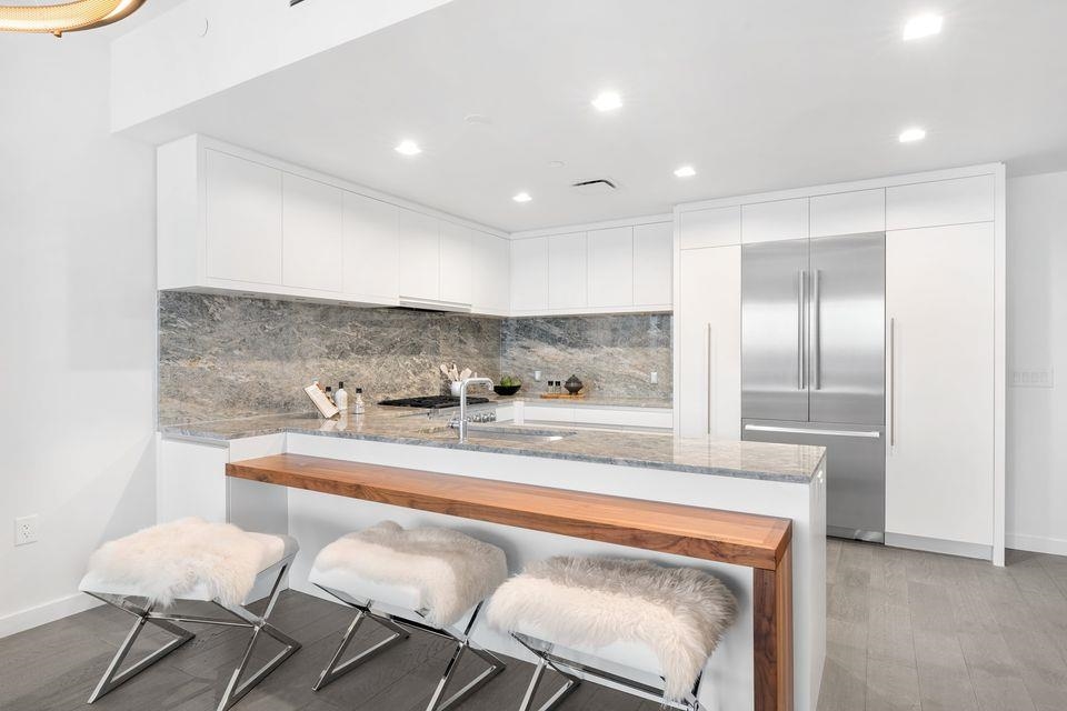 320 Adolphus Avenue, Unit 907 Cliffside Park, NJ 07010 - Photo 5 of 29 a view of dining table chairs and entryway