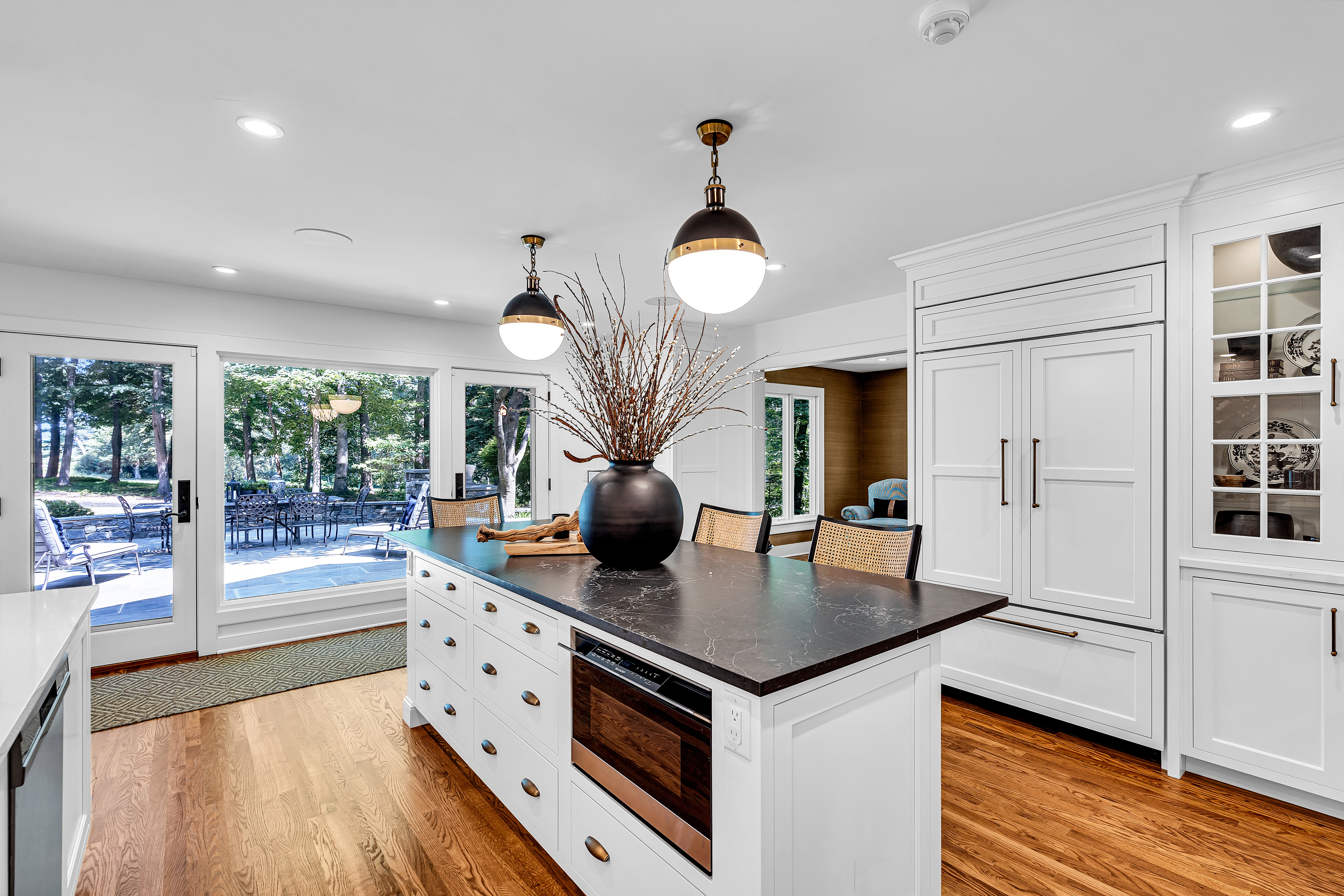 176 Rolling Hill Road Skillman, NJ 08558 - Photo 14 of 49 a kitchen with stainless steel appliances granite countertop a sink a stove and a wooden floors