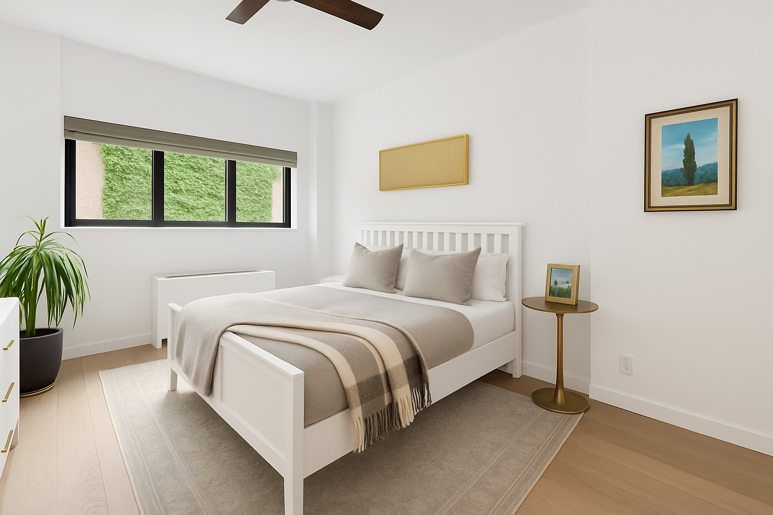 808 Broadway, Unit 4K Manhattan, NY 10003 - Photo 4 of 7 a bedroom with a bed and a potted plant