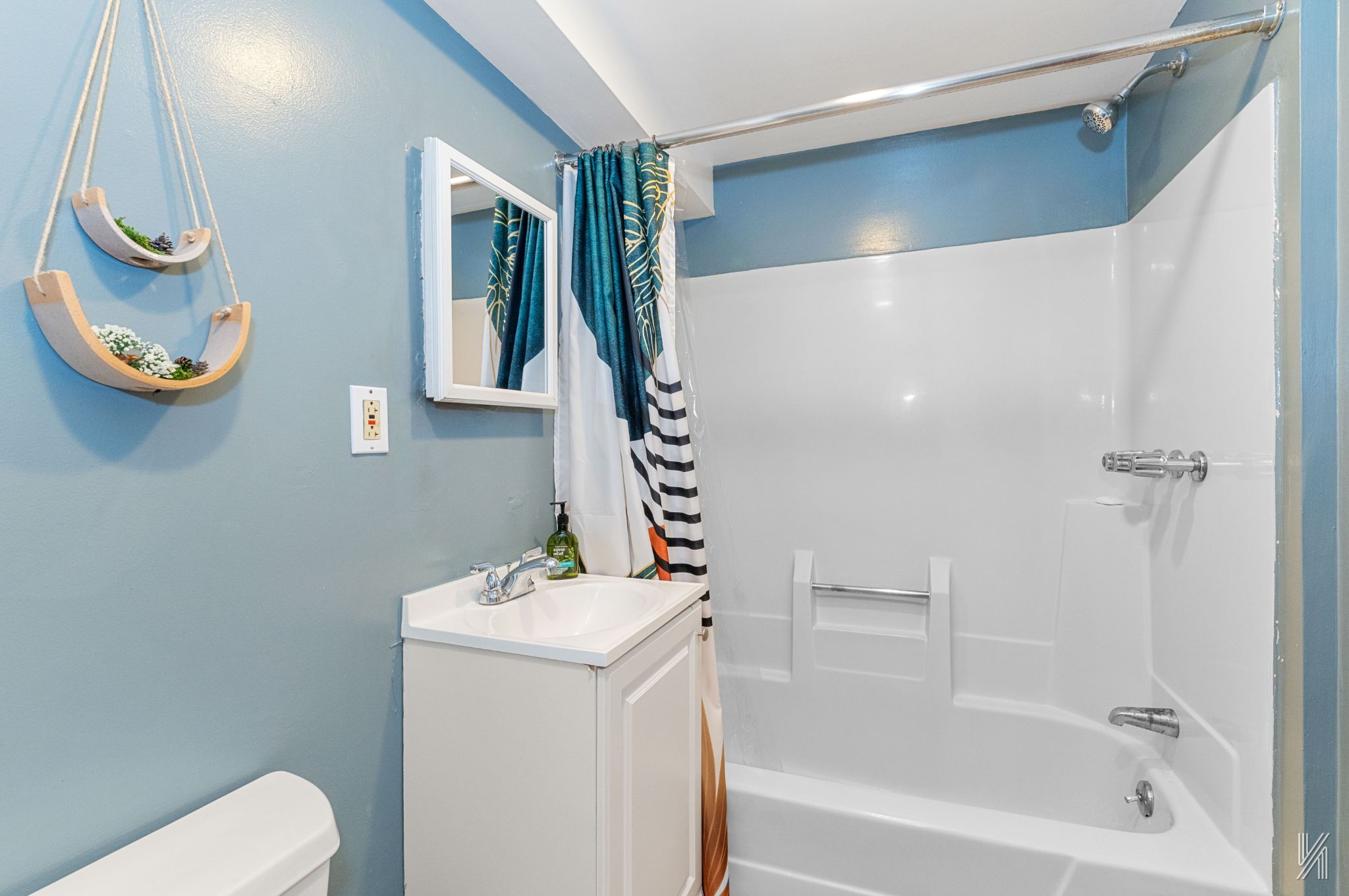 67-17 Eliot Avenue Queens, NY 11379 - Photo 17 of 21 a bathroom with a bathtub a sink and a mirror