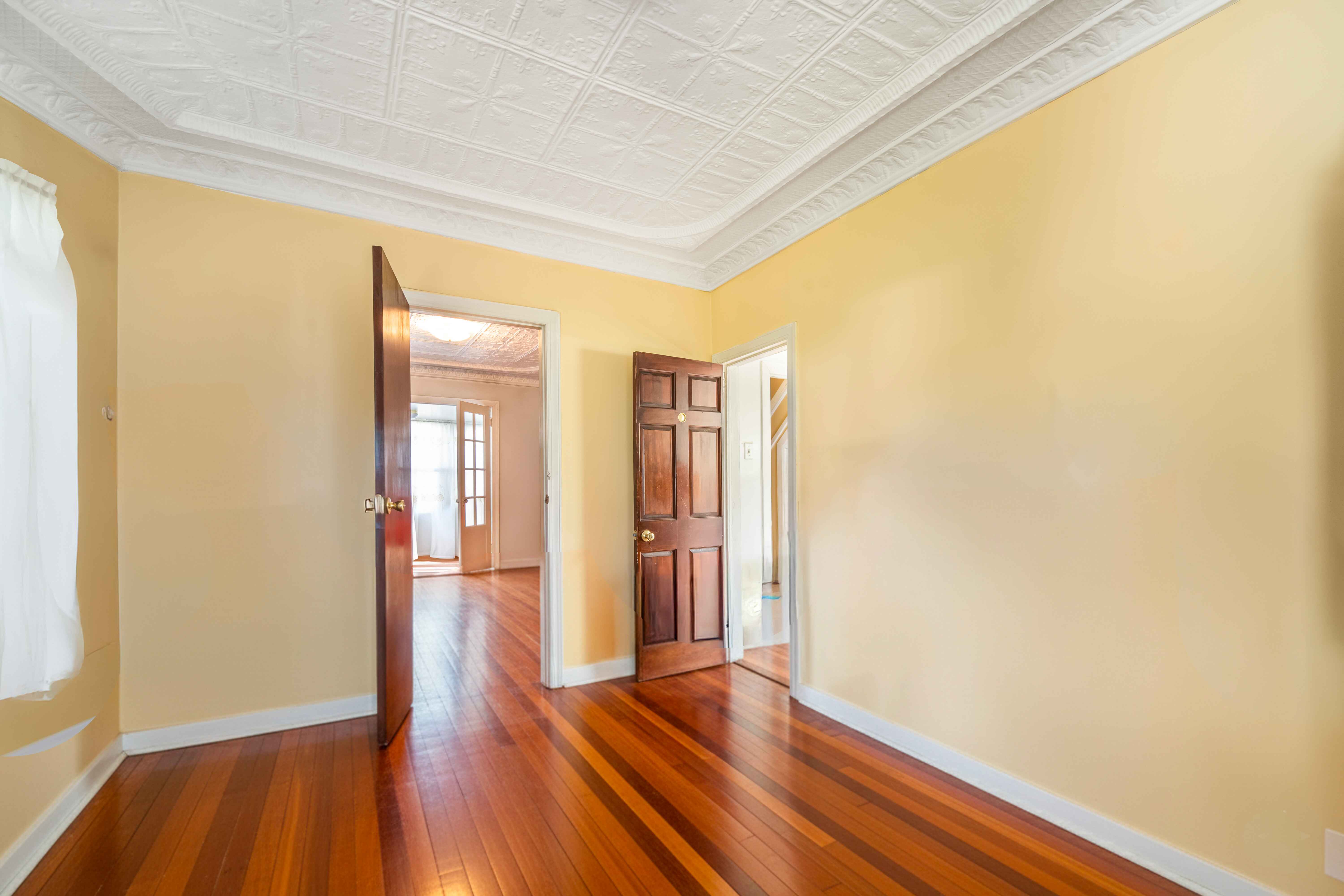 97-30 127th Street Queens, NY 11419 - Photo 6 of 27 a view of wooden floor in an empty room
