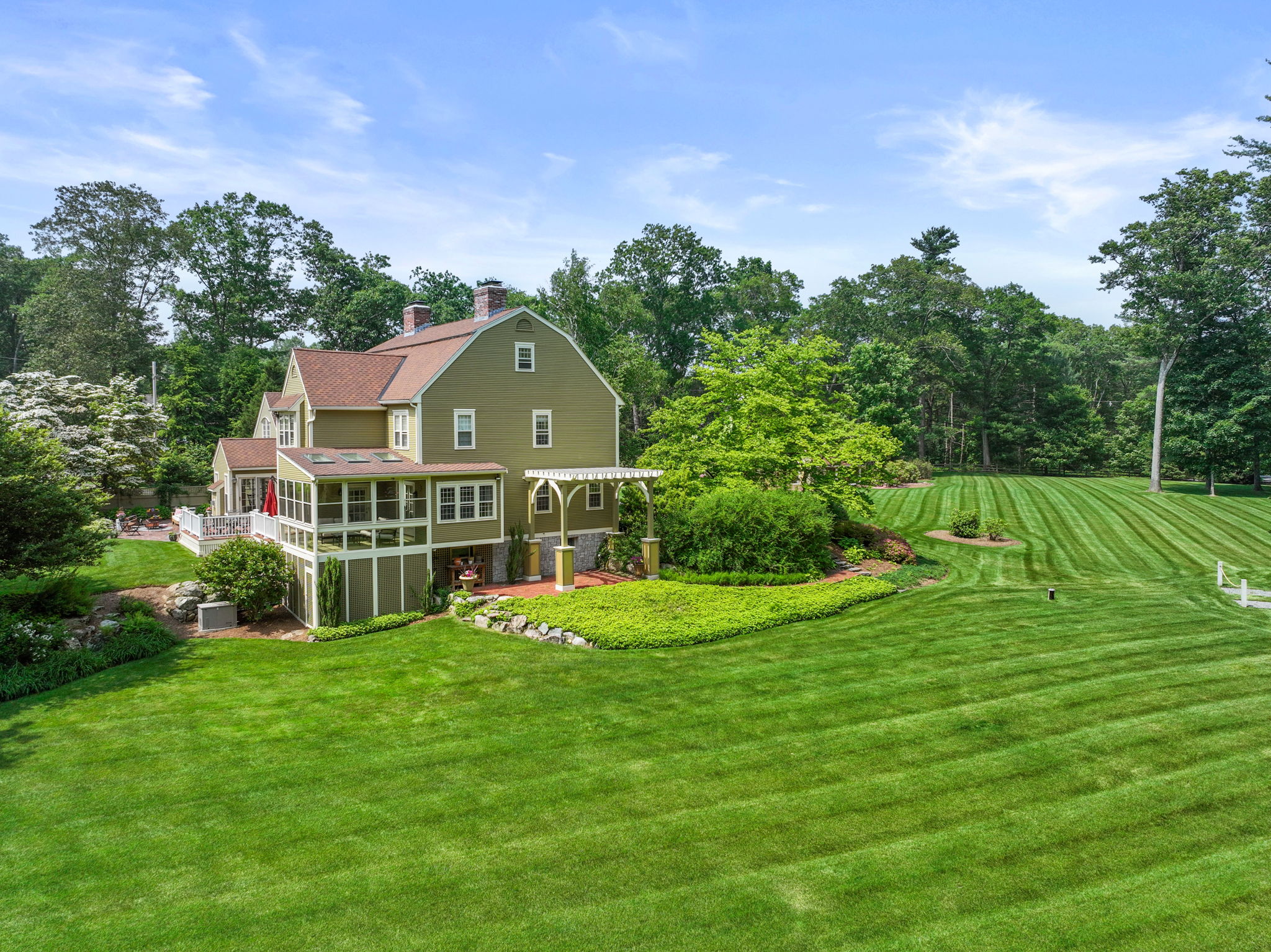 100 Farm Road Sherborn, MA 01770 - Photo 10 of 17 a view of a house with a big yard and large trees