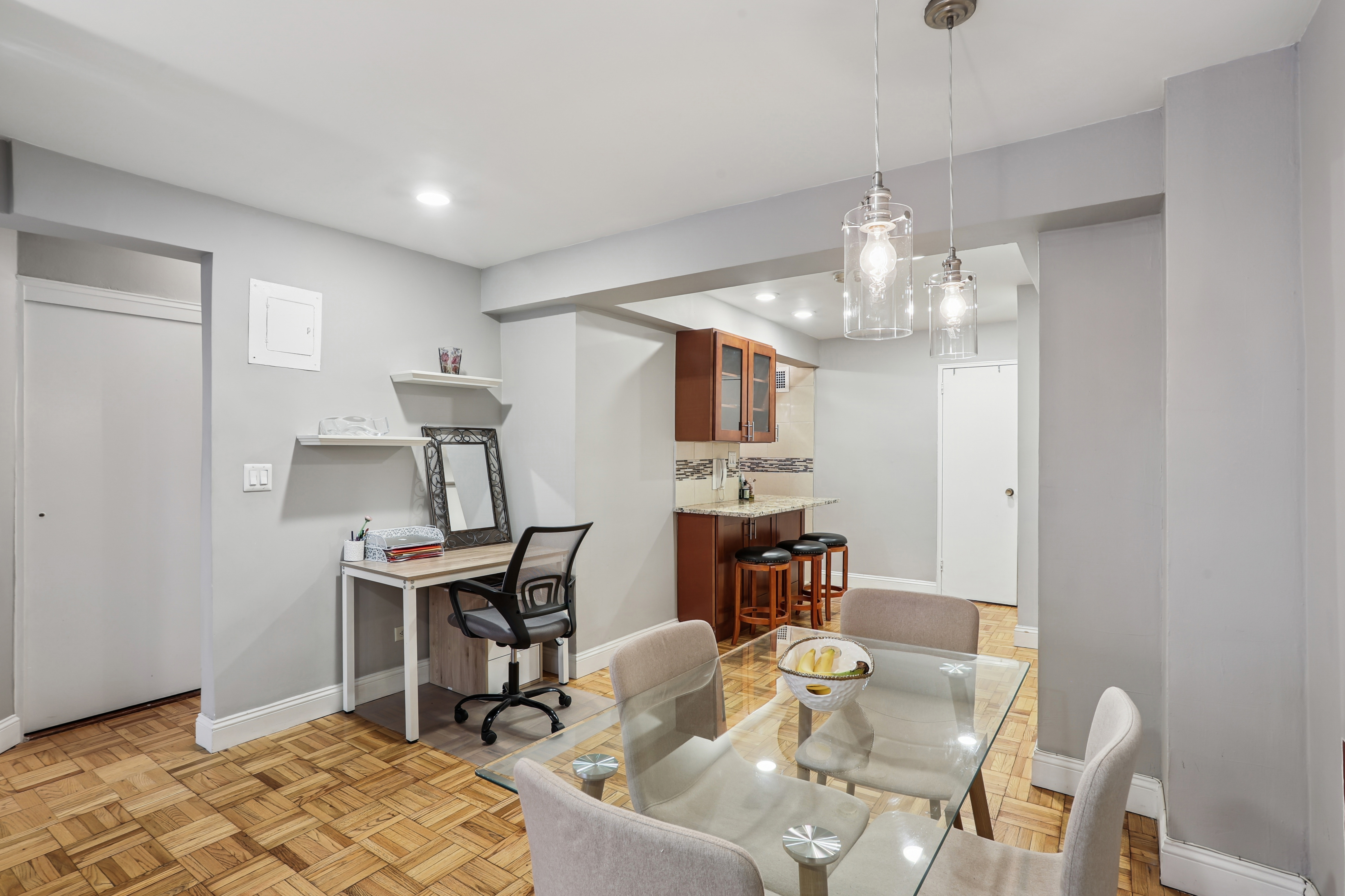 335 East 51st Street, Unit 4H Manhattan, NY 10022 - Photo 5 of 13 a view of a dining room with furniture