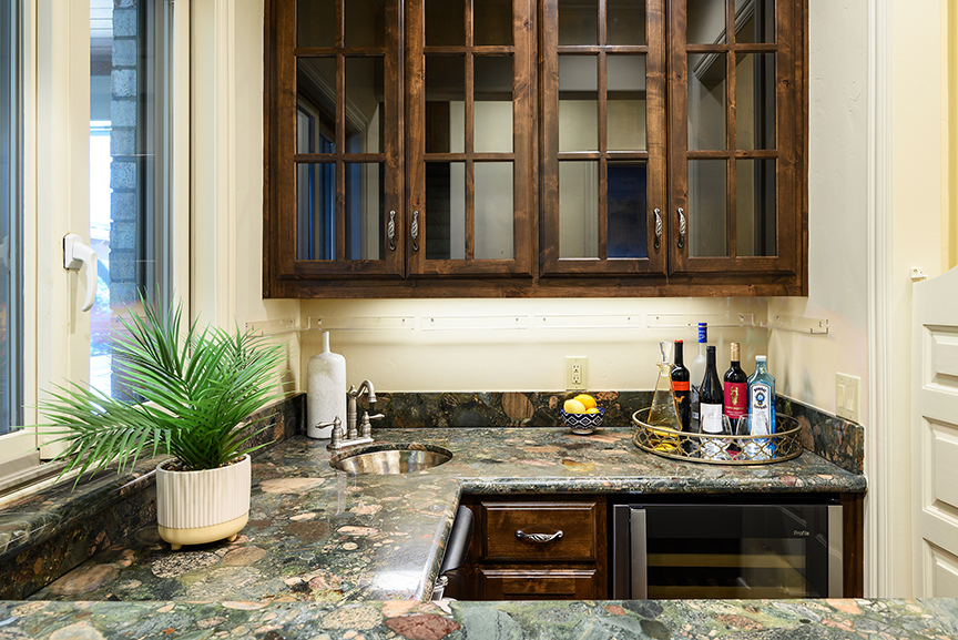 11503 West Ricks Circle Dallas, TX 75230 - Photo 20 of 39 a kitchen with a stove and a potted plant