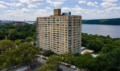 a front view of building with outdoor space