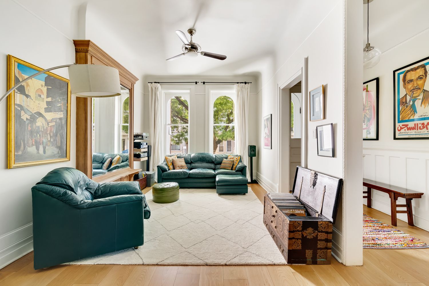 856 St Johns Place Brooklyn, NY 11216 - Photo 2 of 14 a living room with furniture and a large window