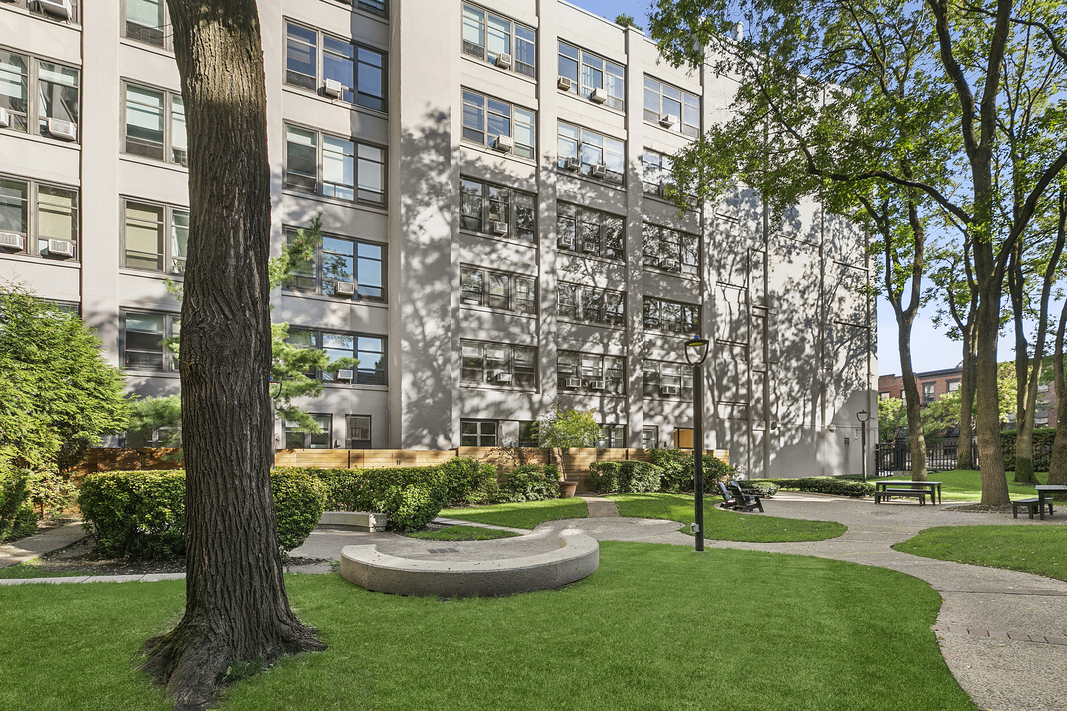 505 Court Street, Unit 3D Brooklyn, NY 11231 - Photo 10 of 14 a garden with trees in front of the house