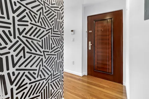 an entryway with a front door