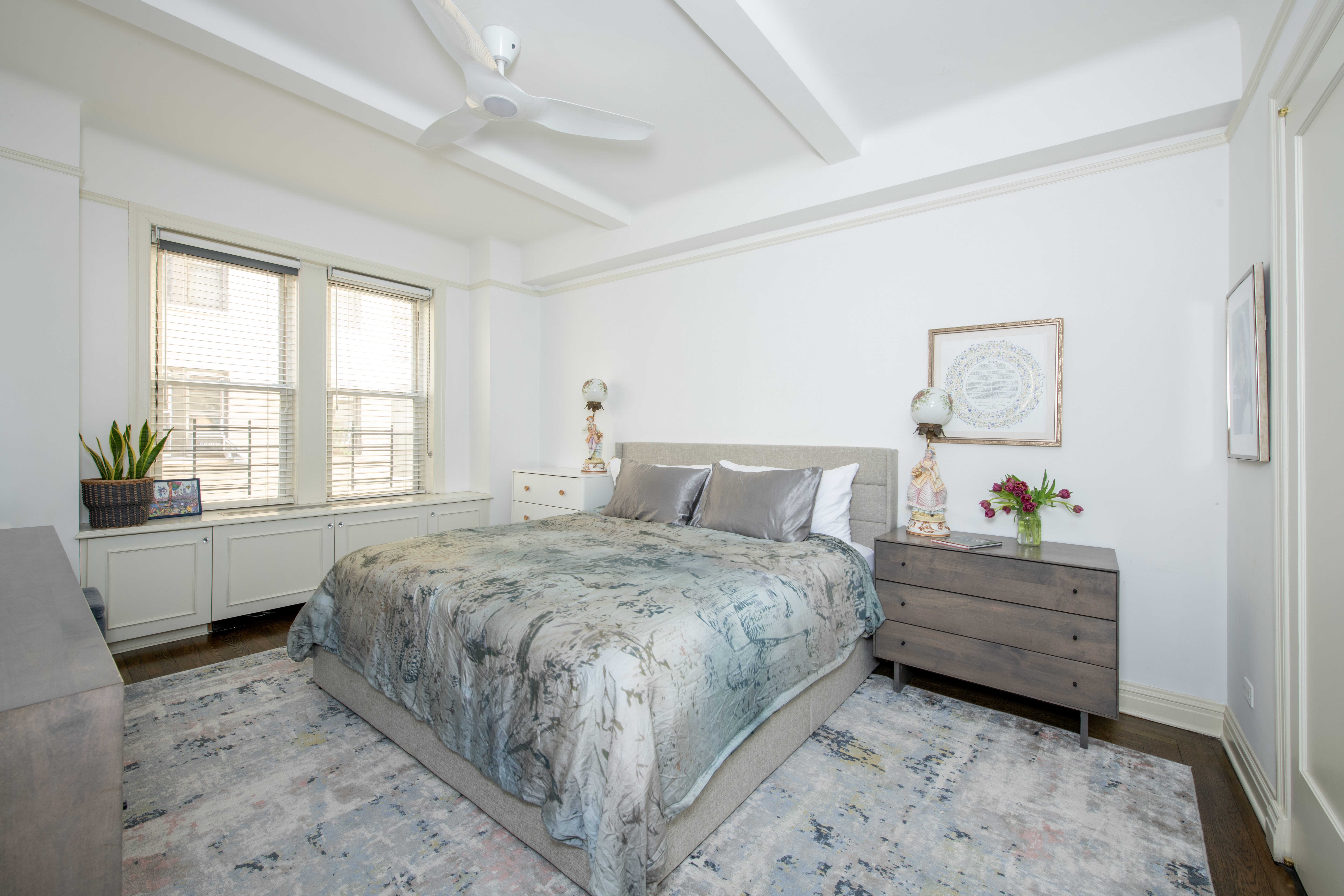 250 West 94th Street, Unit 3F Manhattan, NY 10025 - Photo 3 of 9 a bedroom with a bed and a window