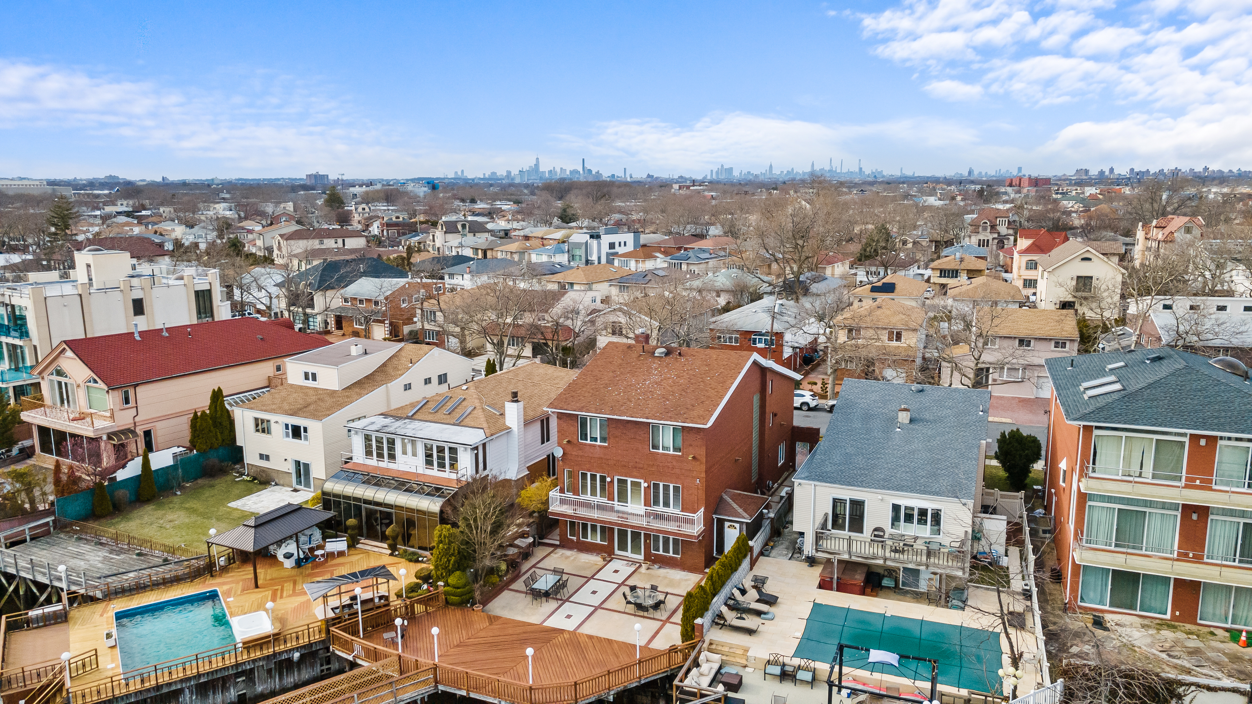 303 Whitman Drive Brooklyn, NY 11234 - Photo 32 of 37 an aerial view of residential houses with city view