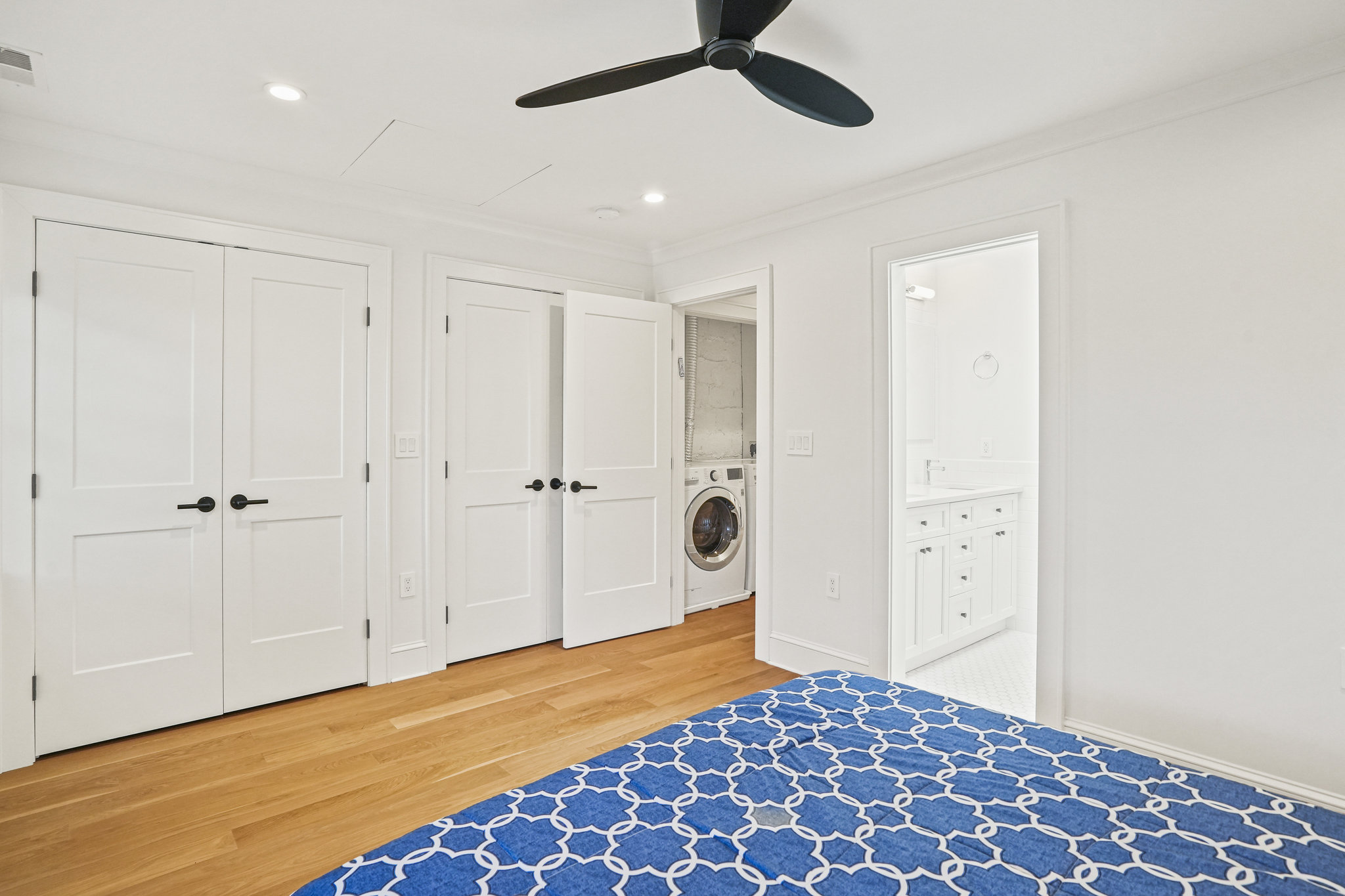 1920 35th Street Northwest Washington, DC 20007 - Photo 18 of 54 a bedroom with a bed and a walk in closet