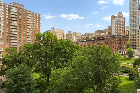 a view of a city with tall buildings