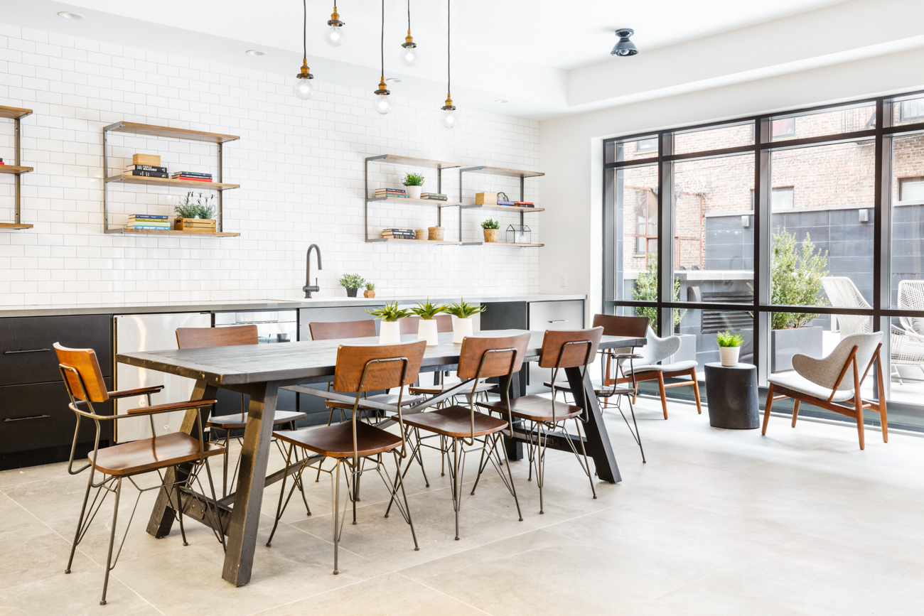 16-26 Madison Street, Unit 4I Queens, NY 11385 - Photo 13 of 18 a dining area with furniture and a large window
