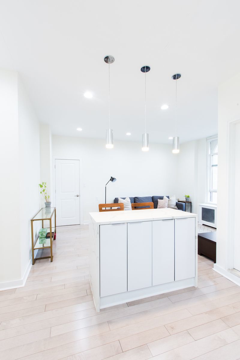 390 West End Avenue, Unit PHK Manhattan, NY 10024 - Photo 7 of 27 a view of kitchen with cabinets and wooden floor